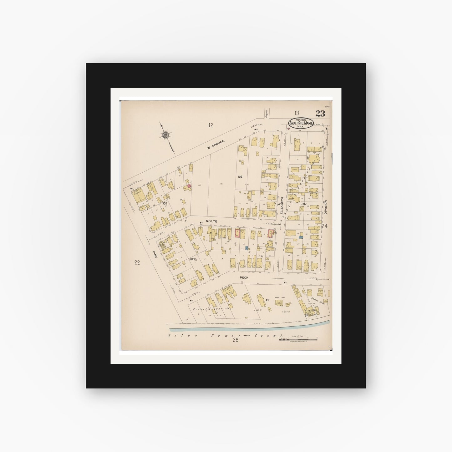 Old map wall art mockup — black gallery frame with white mat — Sanborn Fire Insurance Map from Sault Sainte Marie, Chippewa County, Michigan (1922), Sheet #0023