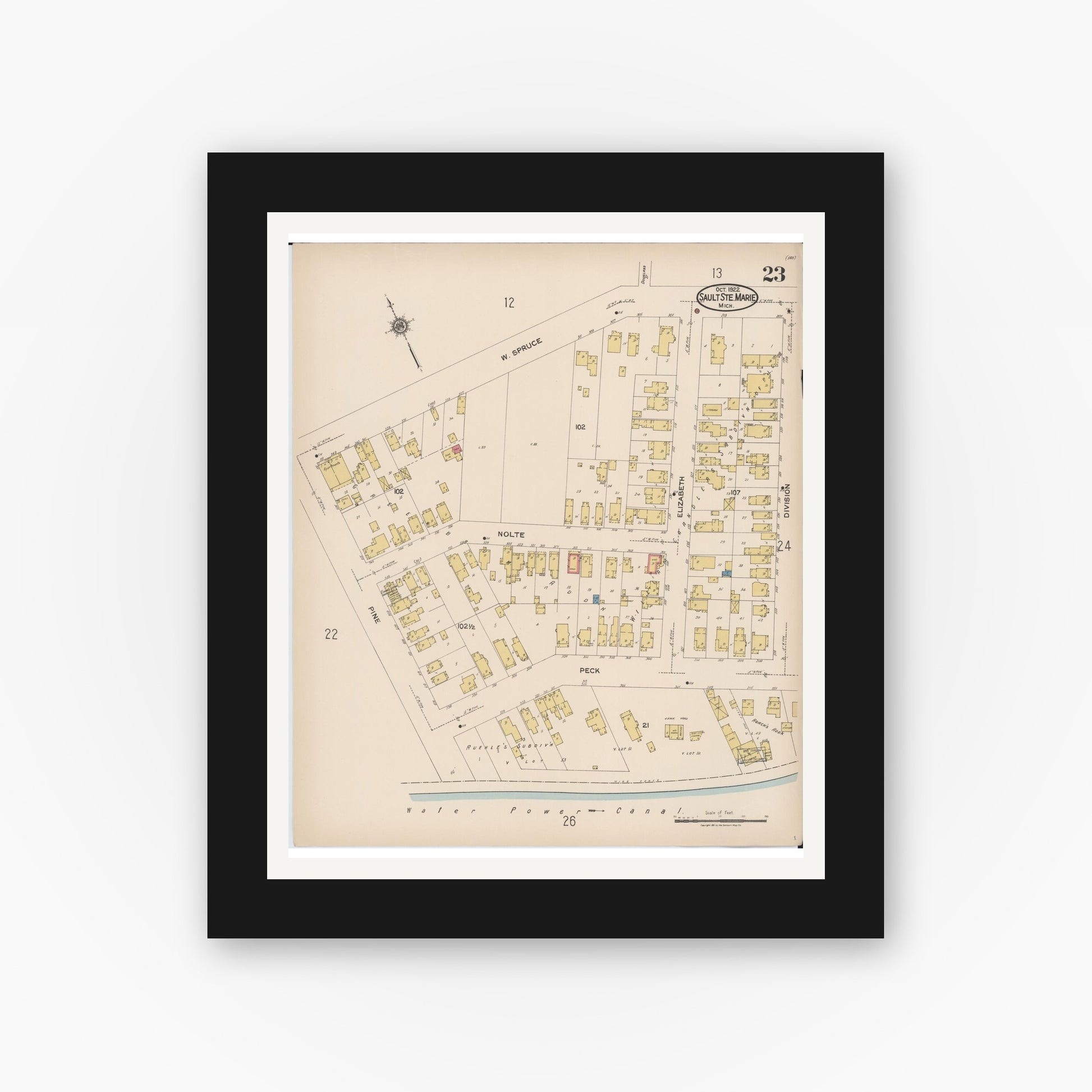 Old map wall art mockup — black gallery frame with white mat — Sanborn Fire Insurance Map from Sault Sainte Marie, Chippewa County, Michigan (1922), Sheet #0023