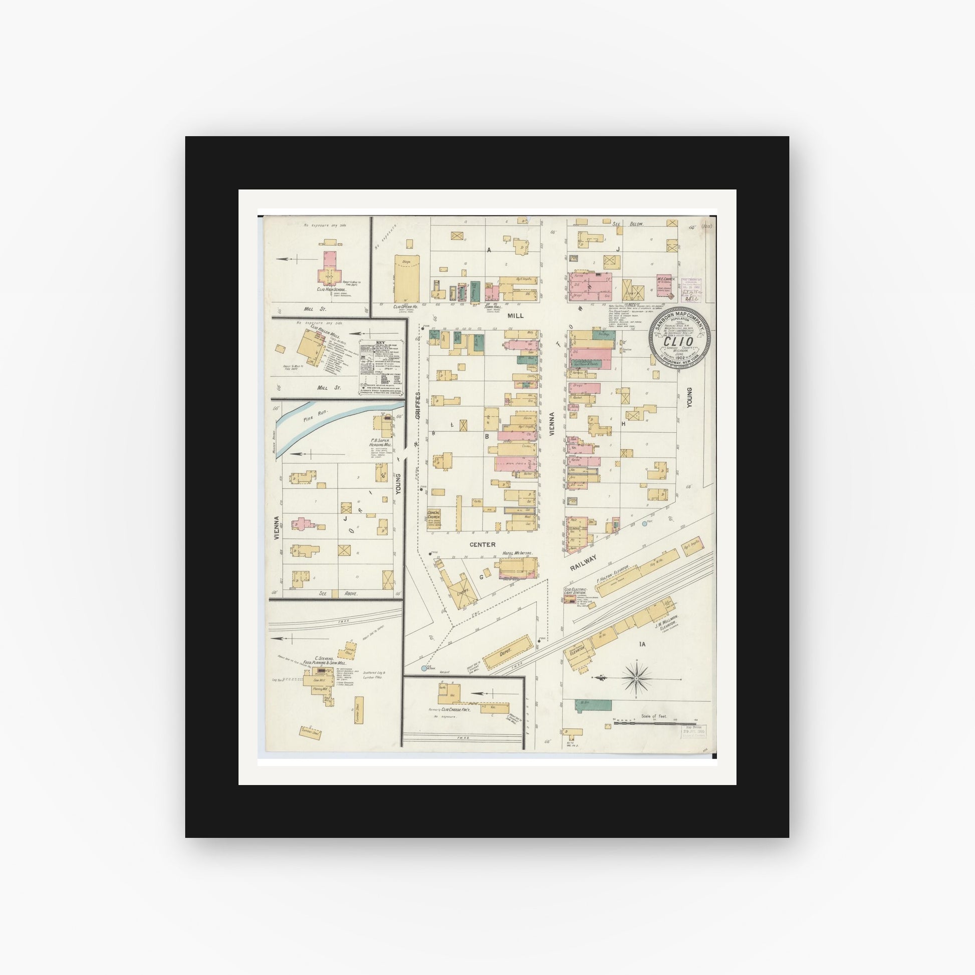 Old map wall art mockup — black gallery frame with white mat — Sanborn Fire Insurance Map from Clio, Genesee County, Michigan (1902), Sheet #0001