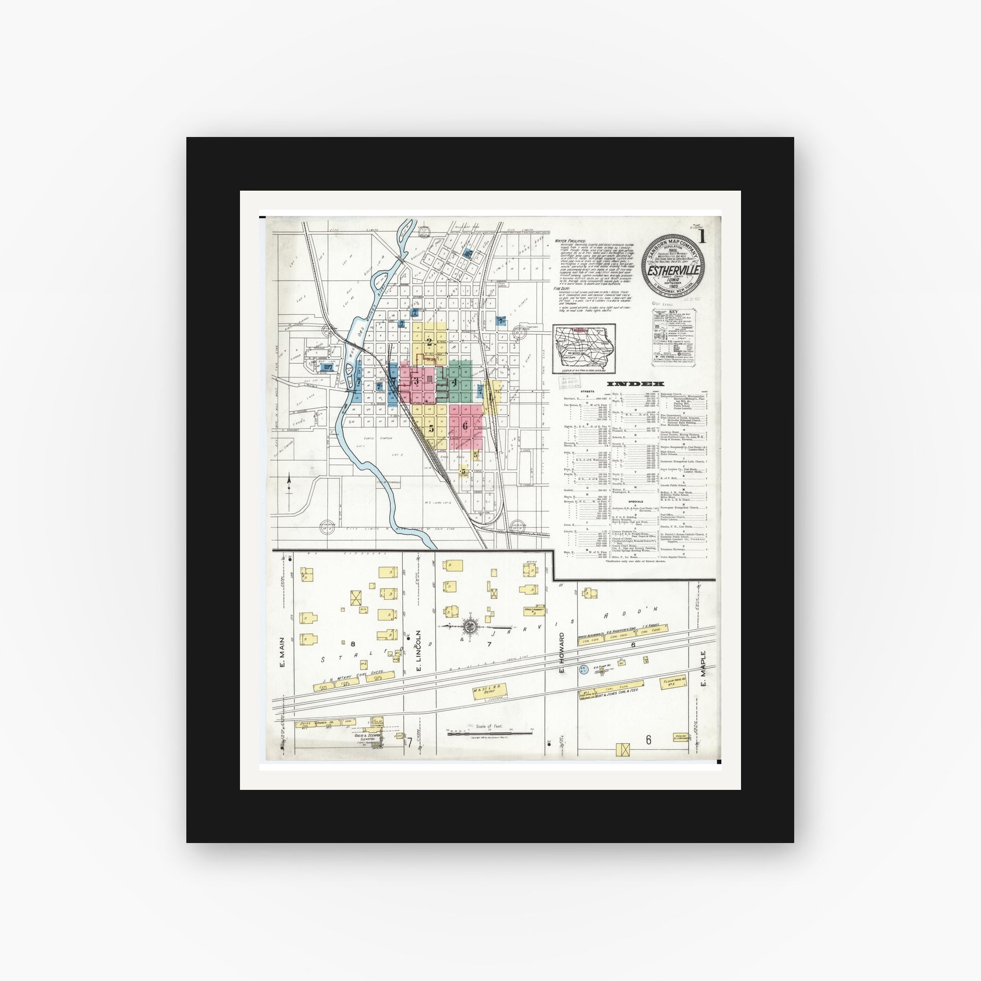 Old map wall art mockup — black gallery frame with white mat — Sanborn Fire Insurance Map from Estherville, Emmet County, Iowa (1920), Sheet #0001