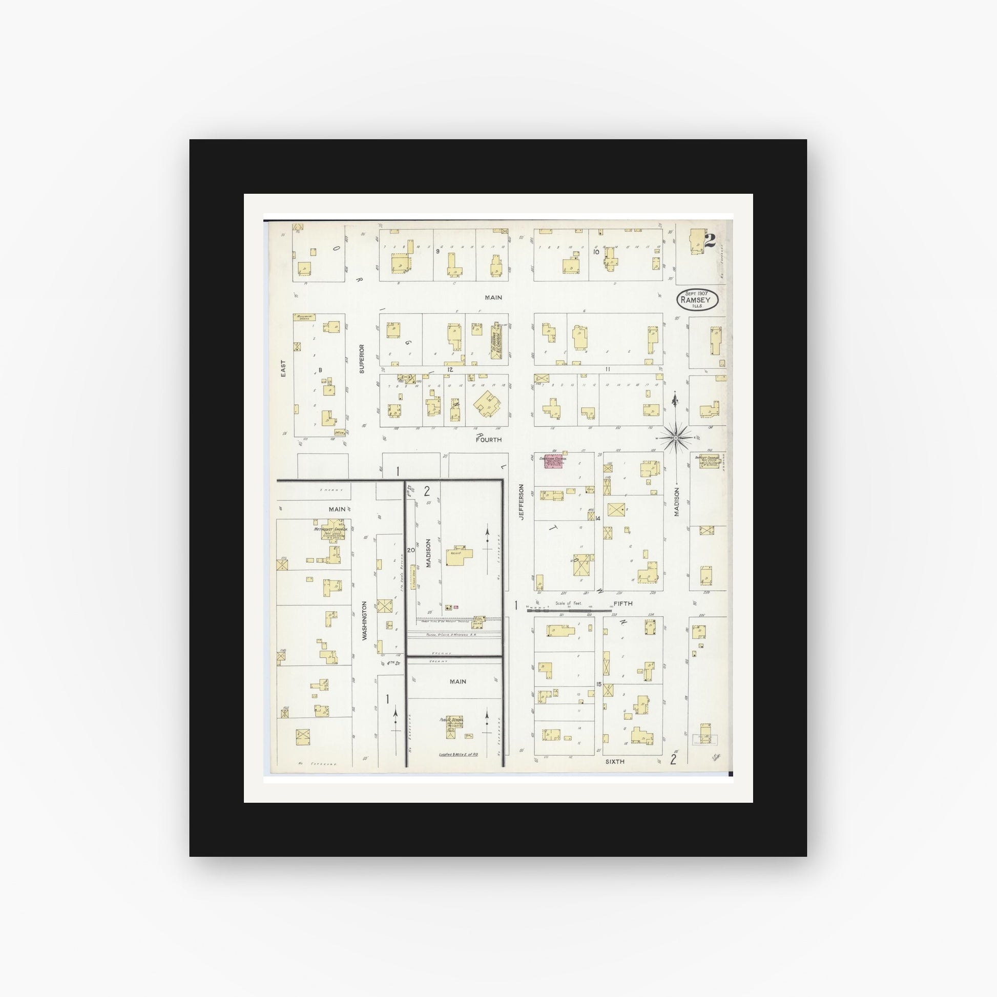 Old map wall art mockup — black gallery frame with white mat — Sanborn Fire Insurance Map from Ramsey, Fayette County, Illinois (1907), Sheet #0002