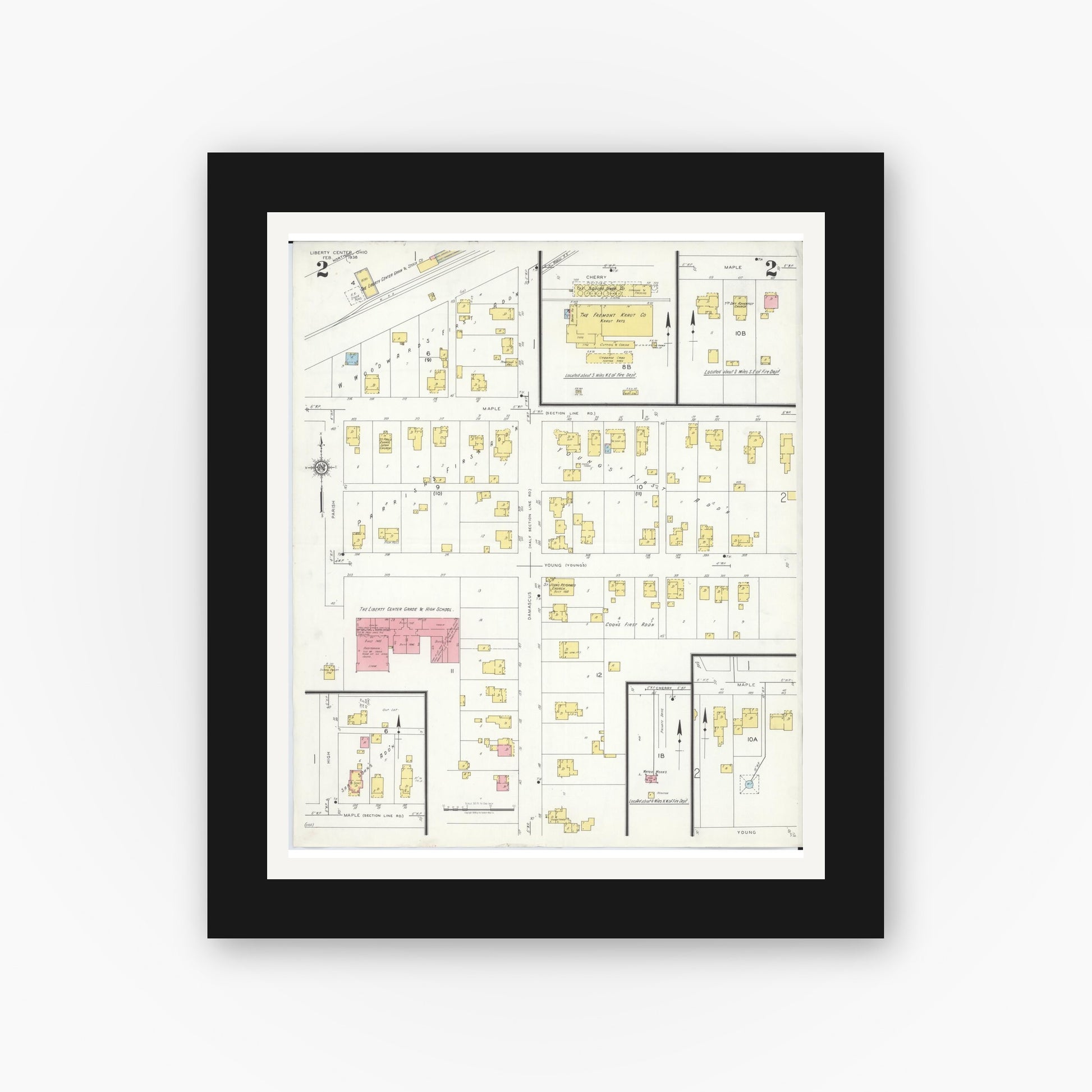 Old map wall art mockup — black gallery frame with white mat — Sanborn Fire Insurance Map from Liberty Center, Henry County, Ohio (1938), Sheet #0002