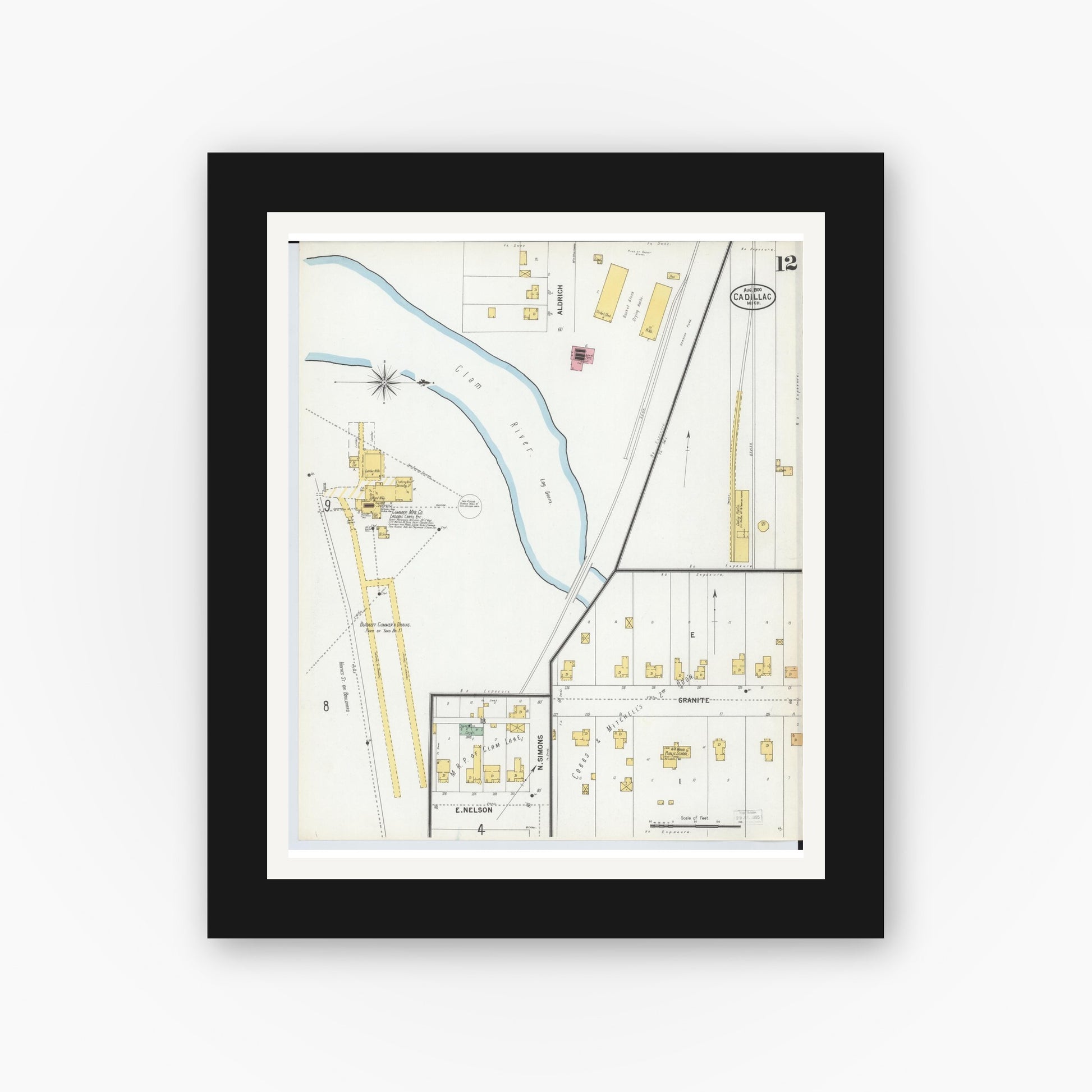 Old map wall art mockup — black gallery frame with white mat — Sanborn Fire Insurance Map from Cadillac, Wexford County, Michigan (1900), Sheet #0012