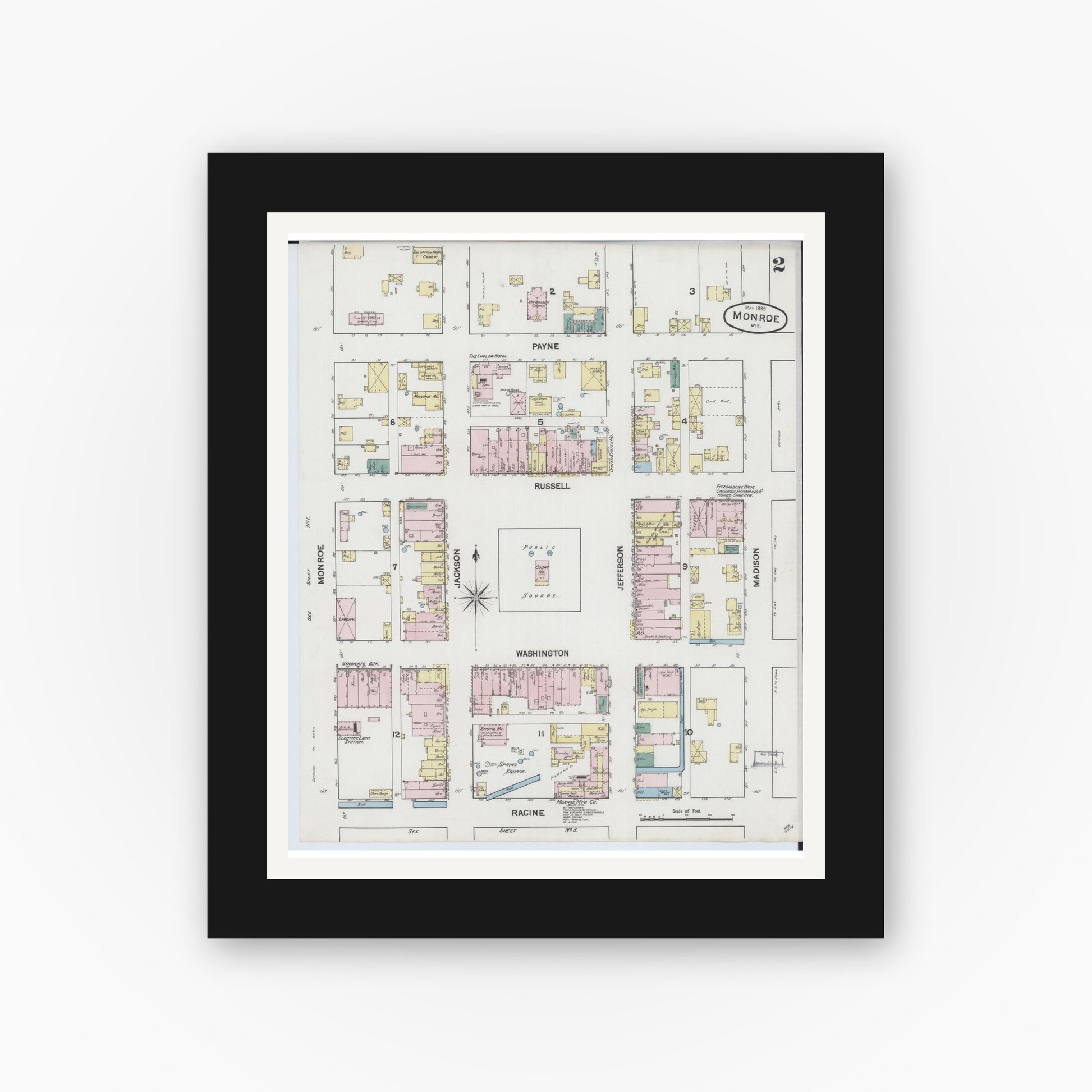Old map wall art mockup — black gallery frame with white mat — Sanborn Fire Insurance Map from Monroe, Green County, Wisconsin (1889), Sheet #0002