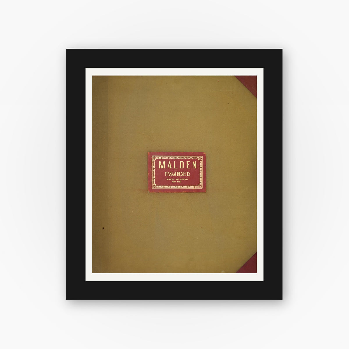 Old map wall art mockup — black gallery frame with white mat — Sanborn Fire Insurance Map from Malden, Middlesex County, Massachusetts (1957), Sheet #0001