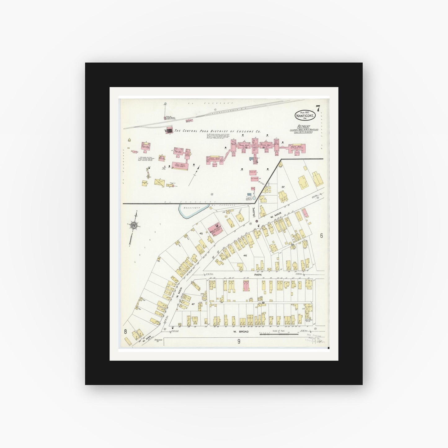Old map wall art mockup — black gallery frame with white mat — Sanborn Fire Insurance Map from Nanticoke, Luzerne County, Pennsylvania (1912), Sheet #0007