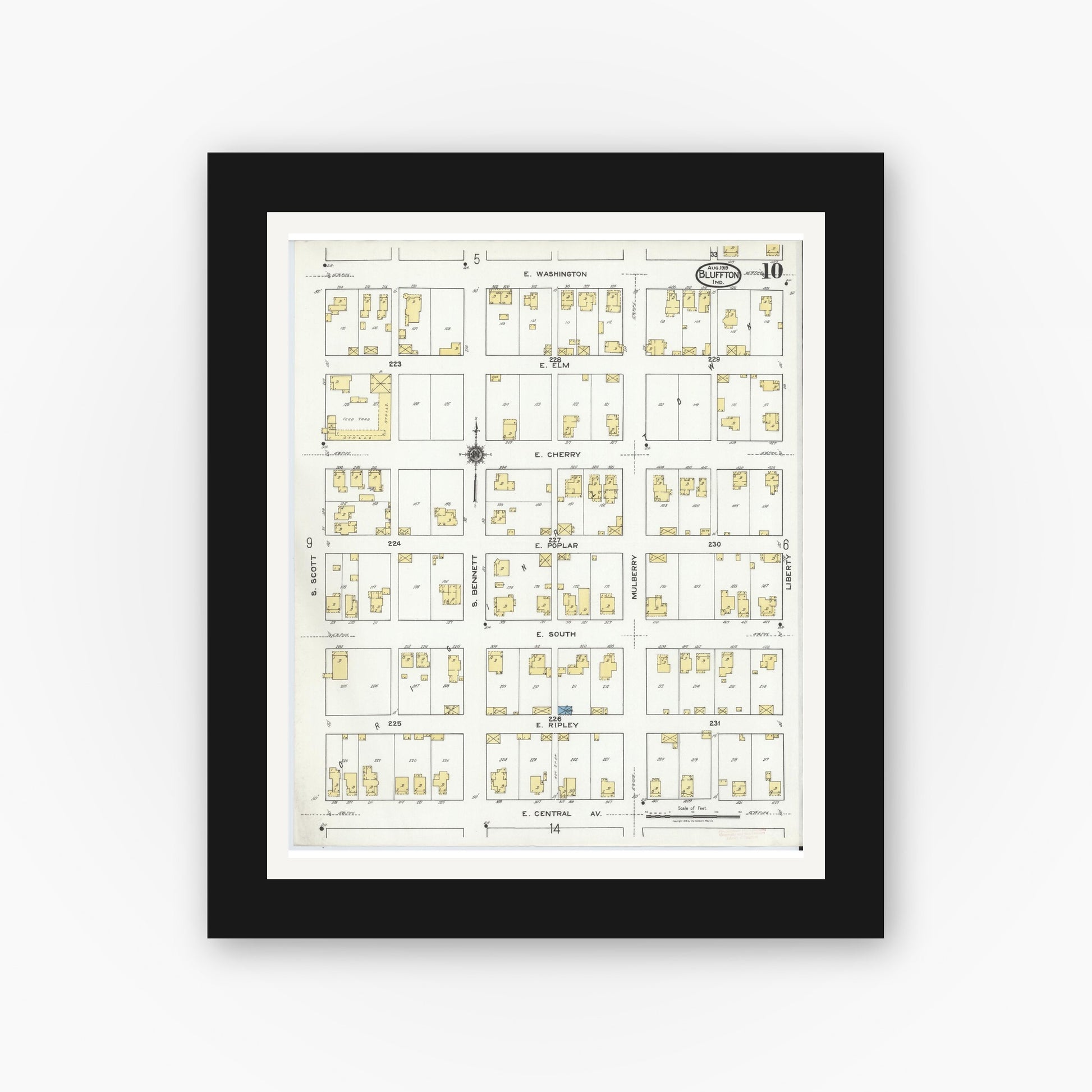 Old map wall art mockup — black gallery frame with white mat — Sanborn Fire Insurance Map from Bluffton, Wells County, Indiana (1919), Sheet #0010