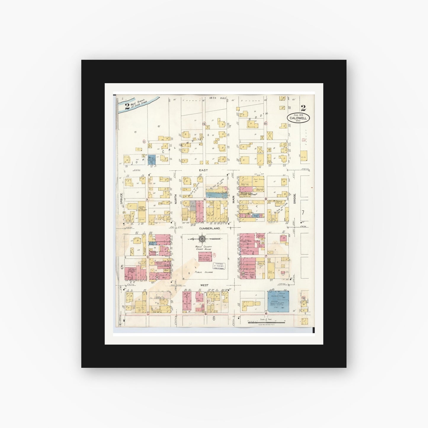 Old map wall art mockup — black gallery frame with white mat — Sanborn Fire Insurance Map from Caldwell, Noble County, Ohio (1932), Sheet #0002
