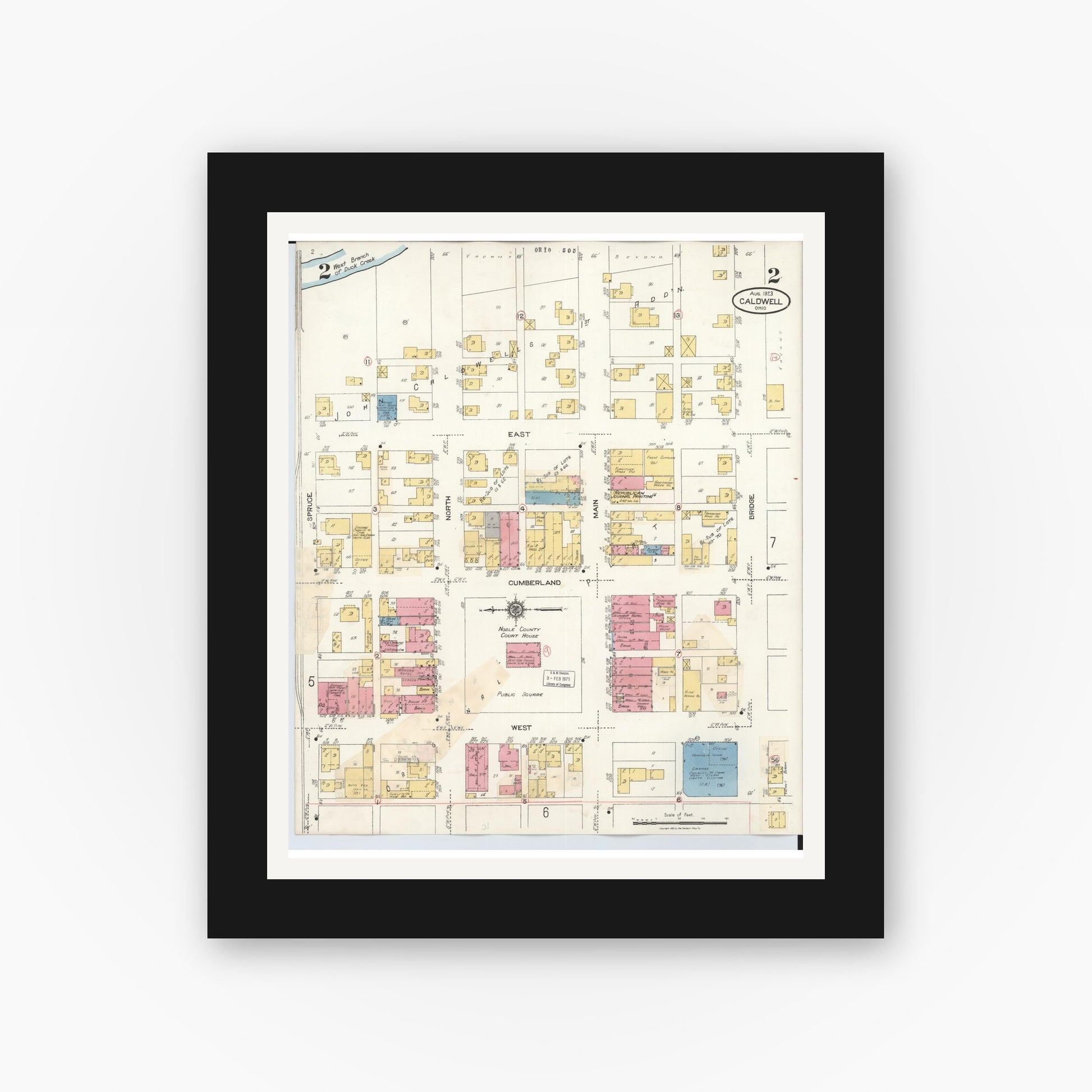 Old map wall art mockup — black gallery frame with white mat — Sanborn Fire Insurance Map from Caldwell, Noble County, Ohio (1932), Sheet #0002