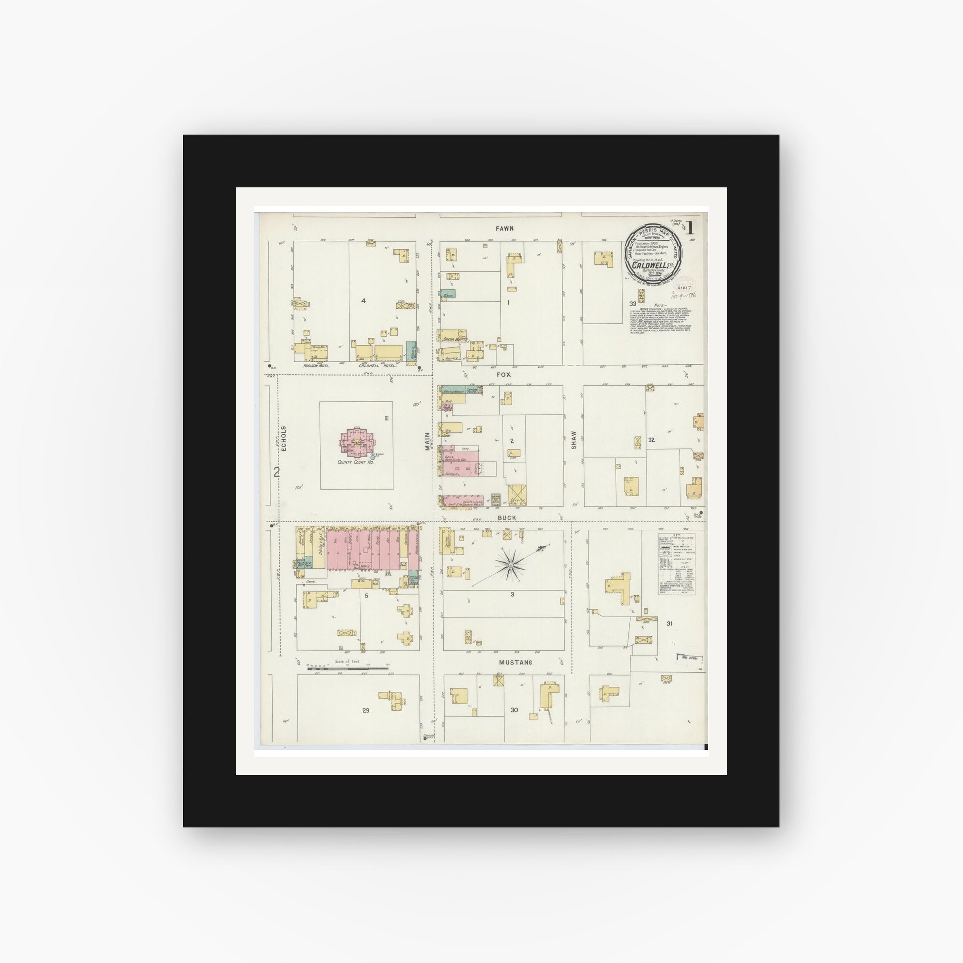 Old map wall art mockup — black gallery frame with white mat — Sanborn Fire Insurance Map from Caldwell, Burleson County, Texas (1896), Sheet #0001