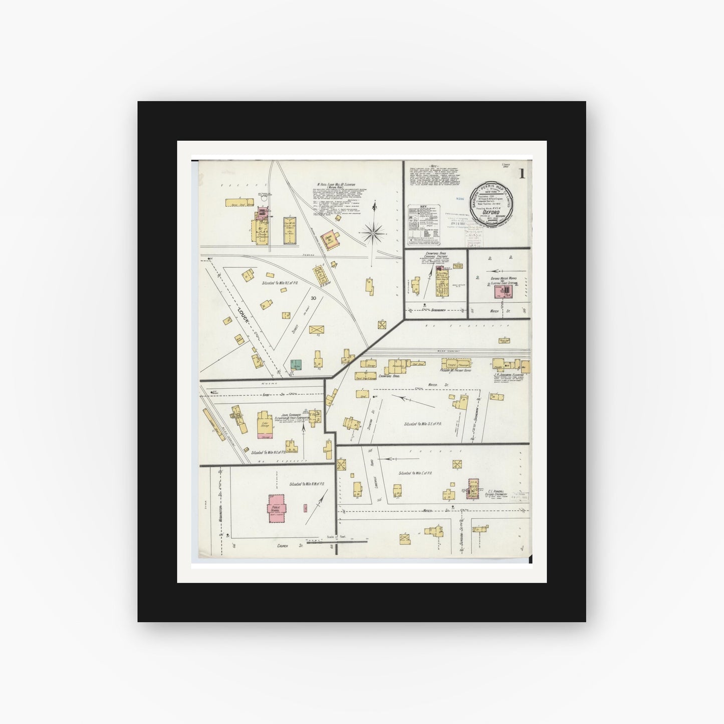 Old map wall art mockup — black gallery frame with white mat — Sanborn Fire Insurance Map from Oxford, Oakland County, Michigan (1900) - Complete Map Set