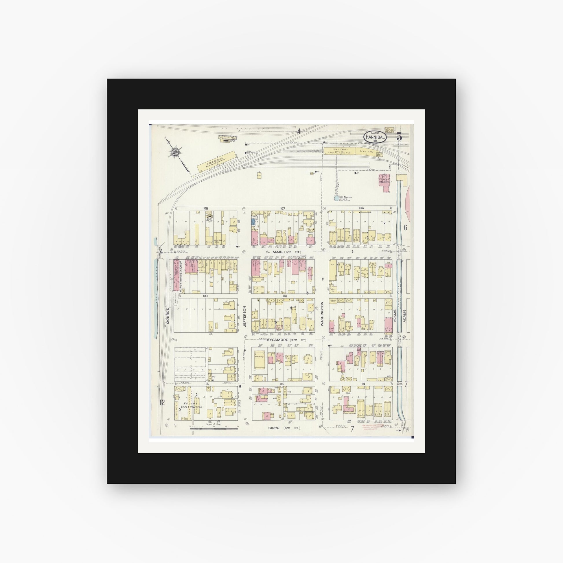 Old map wall art mockup — black gallery frame with white mat — Sanborn Fire Insurance Map from Hannibal, Marion County, Missouri (1913), Sheet #0005
