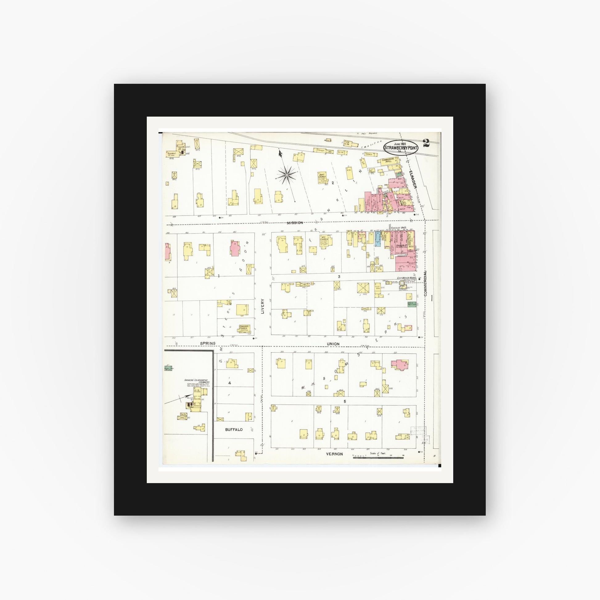 Old map wall art mockup — black gallery frame with white mat — Sanborn Fire Insurance Map from Strawberry Point, Clayton County, Iowa (1902), Sheet #0002