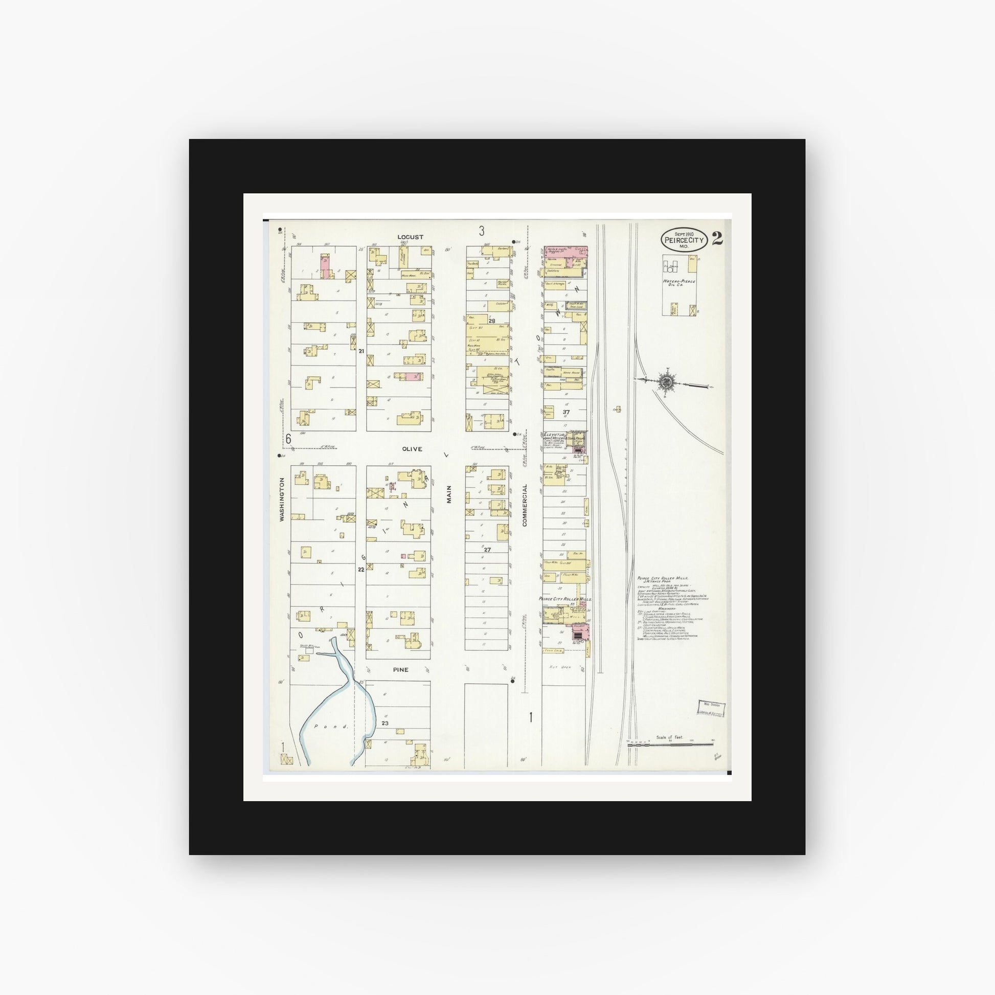 Old map wall art mockup — black gallery frame with white mat — Sanborn Fire Insurance Map from Pierce City, Lawrence County, Missouri (1910), Sheet #0002