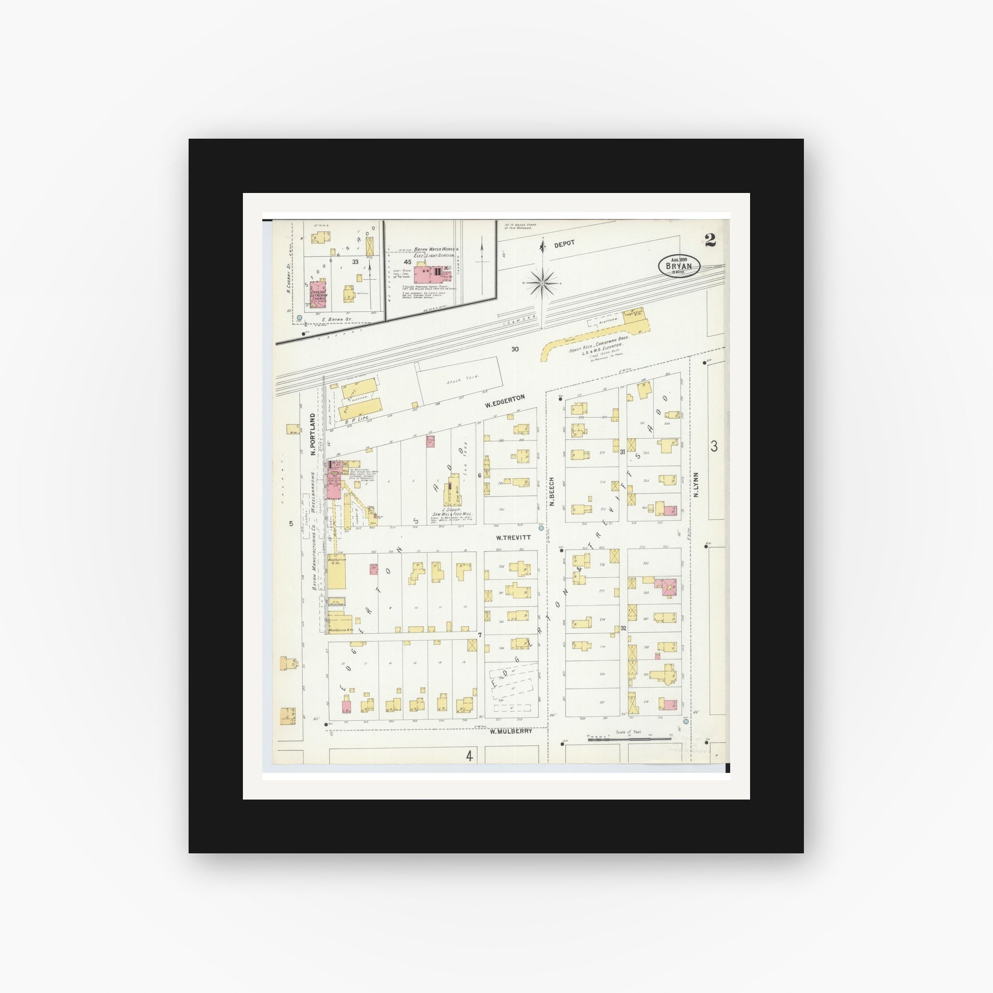 Old map wall art mockup — black gallery frame with white mat — Sanborn Fire Insurance Map from Bryan, Williams County, Ohio (1899), Sheet #0002
