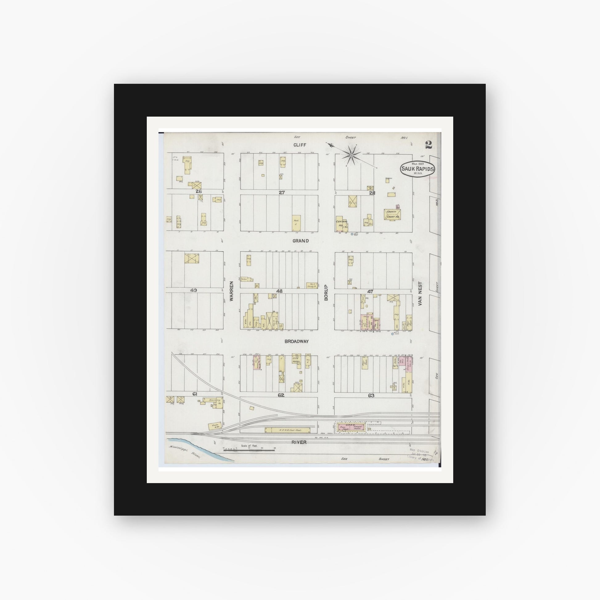 Old map wall art mockup — black gallery frame with white mat — Sanborn Fire Insurance Map from Sauk Rapids, Benton County, Minnesota (1889), Sheet #0002