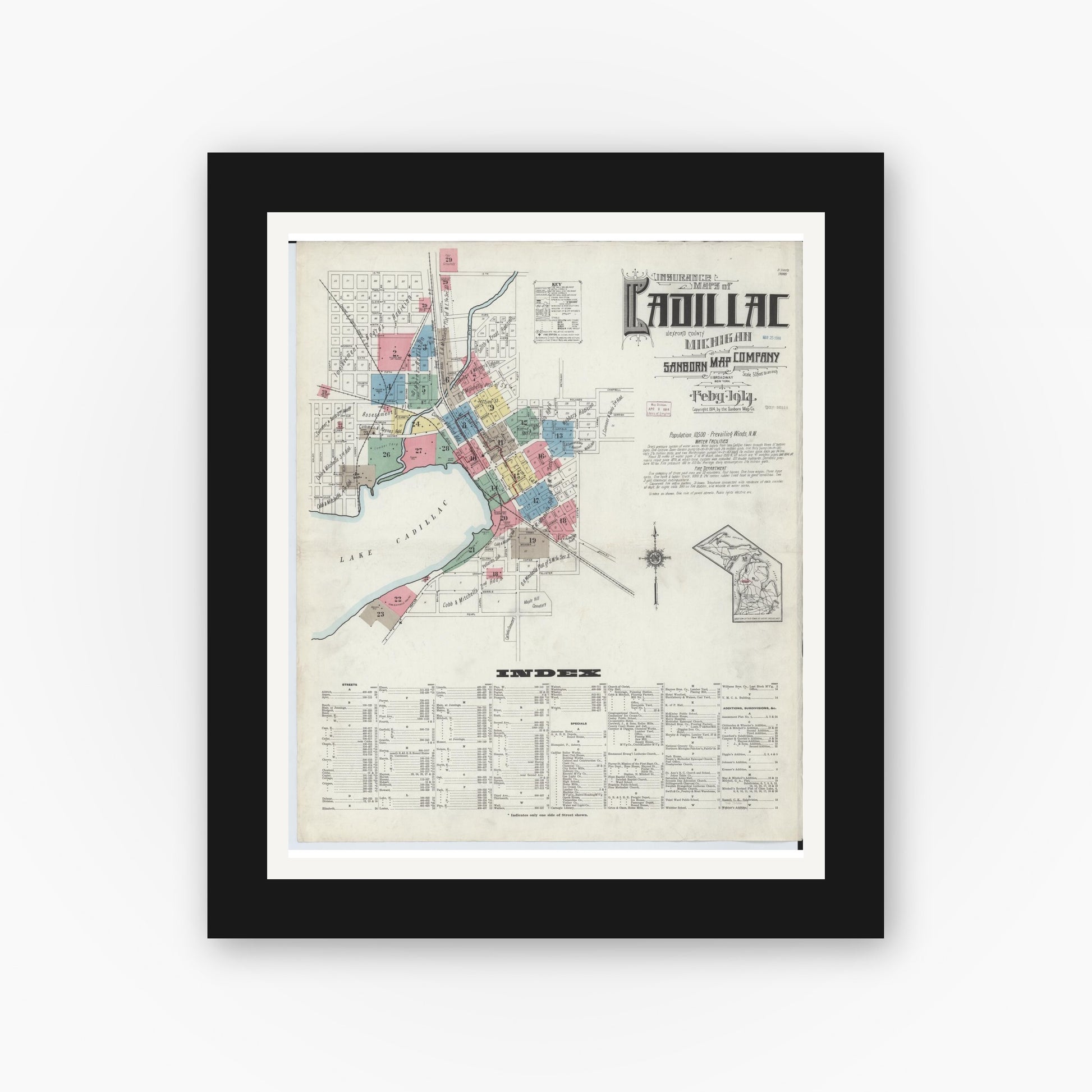 Old map wall art mockup — black gallery frame with white mat — Sanborn Fire Insurance Map from Cadillac, Wexford County, Michigan (1914) - Complete Map Set