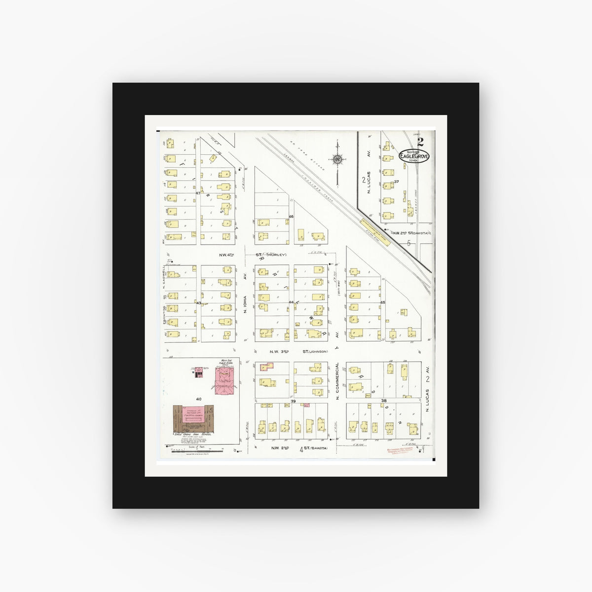 Old map wall art mockup — black gallery frame with white mat — Sanborn Fire Insurance Map from Eagle Grove, Wright County, Iowa (1921), Sheet #0002