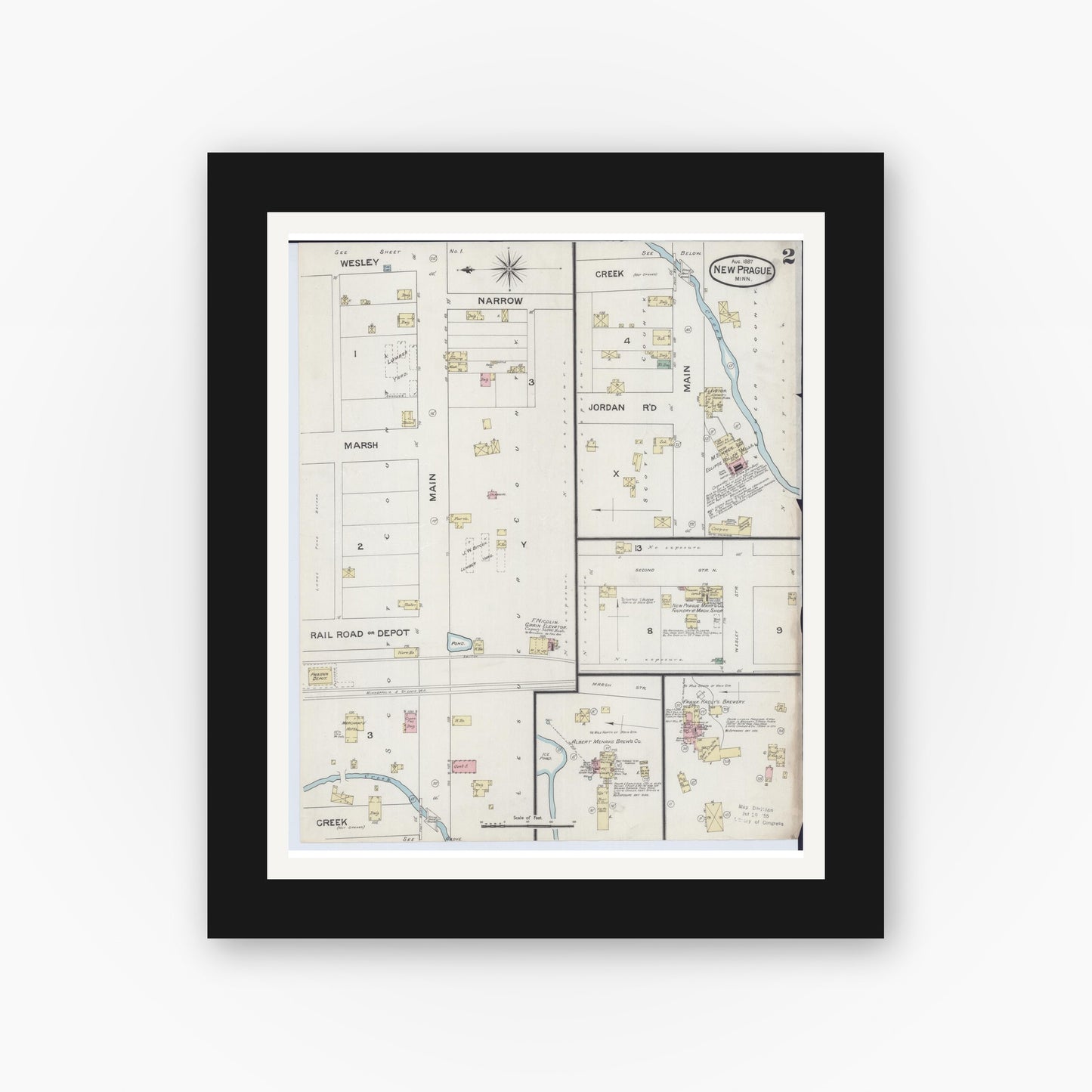 Old map wall art mockup — black gallery frame with white mat — Sanborn Fire Insurance Map from New Prague, Scott And Le Sueur, Minnesota (1887), Sheet #0002