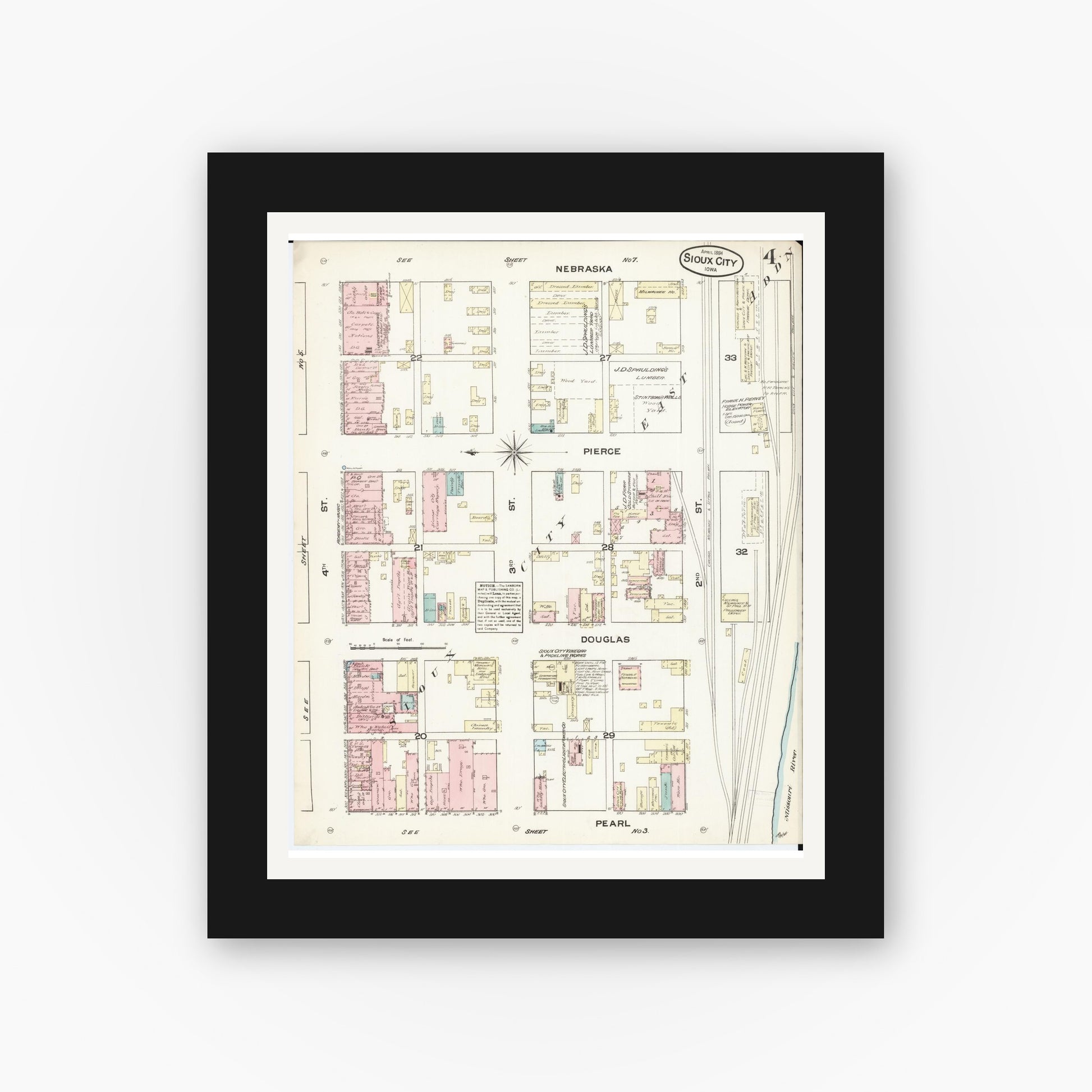 Old map wall art mockup — black gallery frame with white mat — Sanborn Fire Insurance Map from Sioux City, Woodbury County, Iowa (1884), Sheet #0004