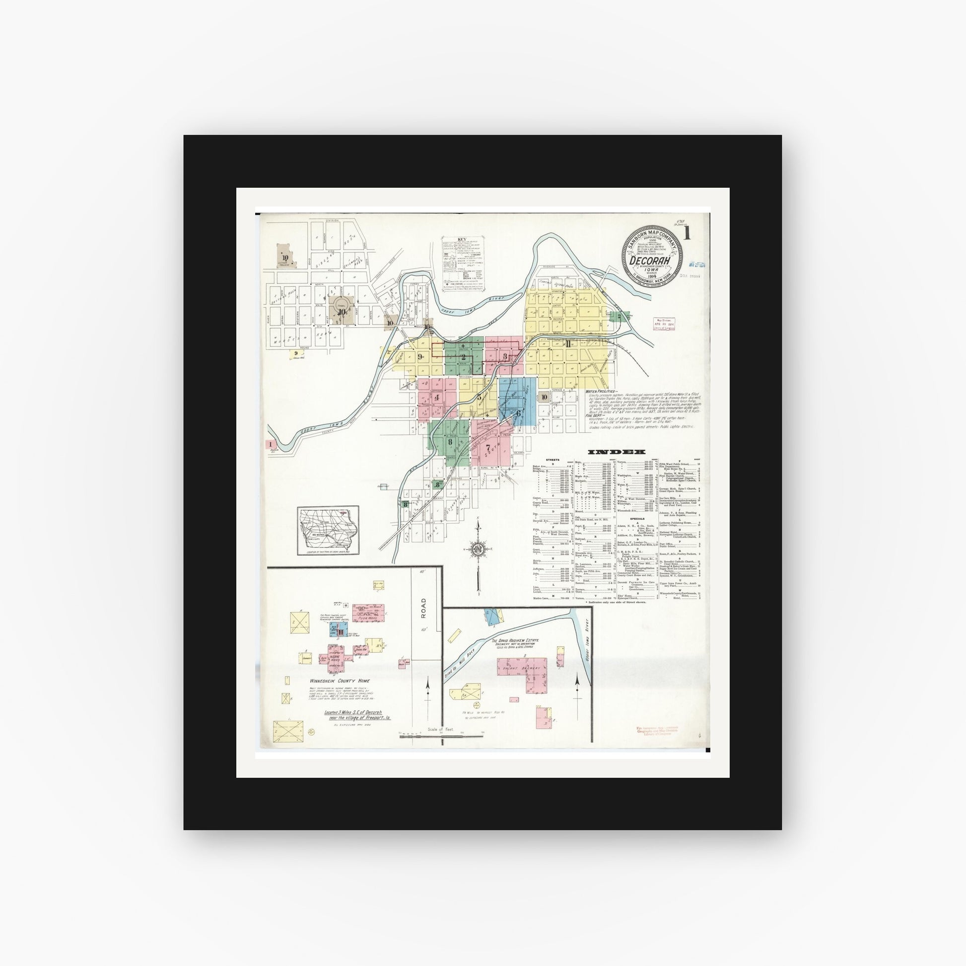 Old map wall art mockup — black gallery frame with white mat — Sanborn Fire Insurance Map from Decorah, Winneshiek County, Iowa (1914) â€” Complete Set