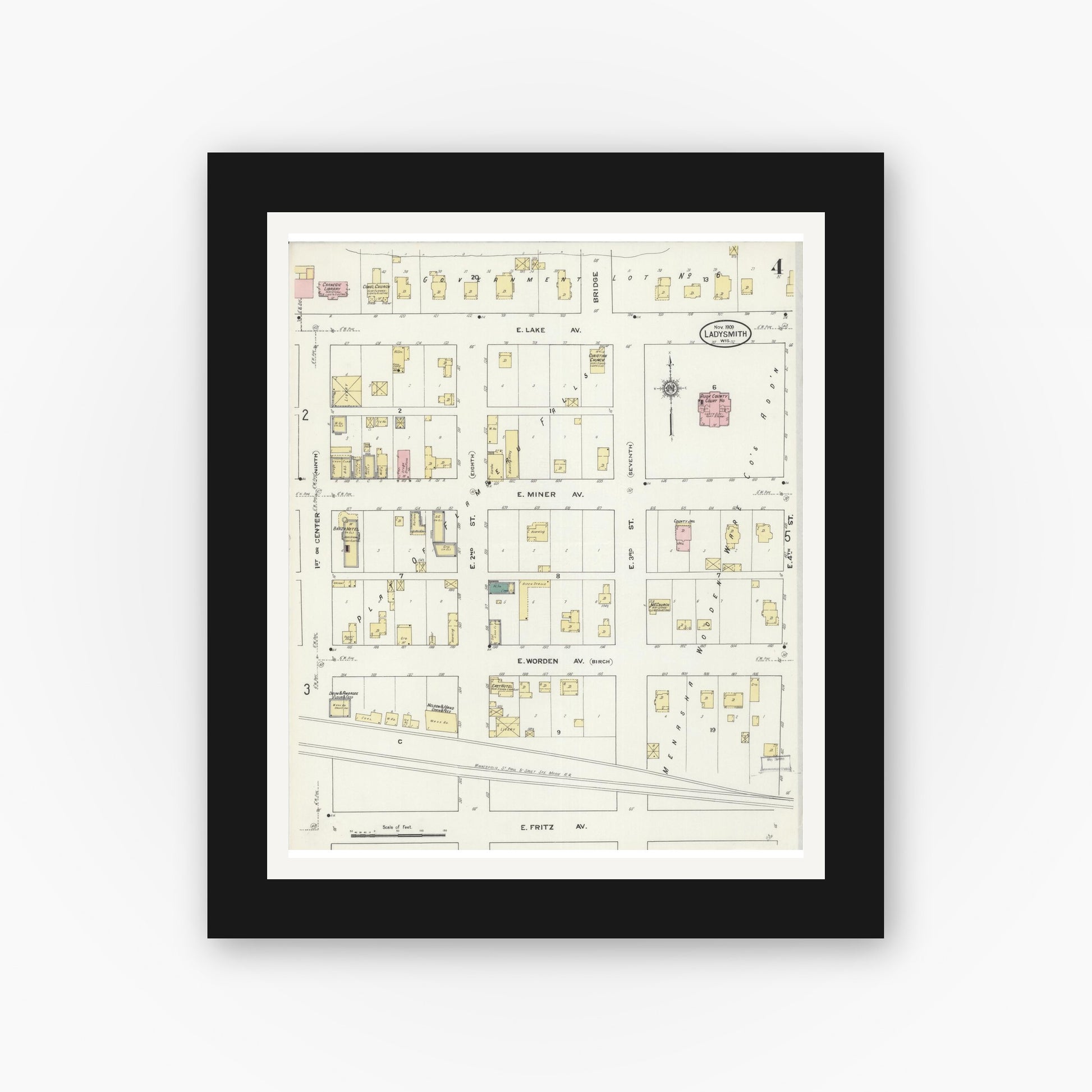 Old map wall art mockup — black gallery frame with white mat — Sanborn Fire Insurance Map from Ladysmith, Rusk County, Wisconsin (1909), Sheet #0004