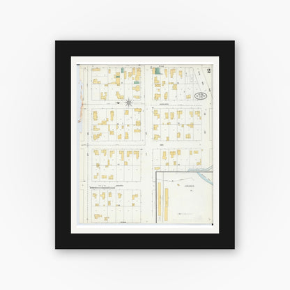 Old map wall art mockup — black gallery frame with white mat — Sanborn Fire Insurance Map from Evart, Osceola County, Michigan (1904), Sheet #0002