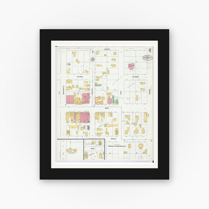 Old map wall art mockup — black gallery frame with white mat — Sanborn Fire Insurance Map from Carson City, Montcalm County, Michigan (1900), Sheet #0002