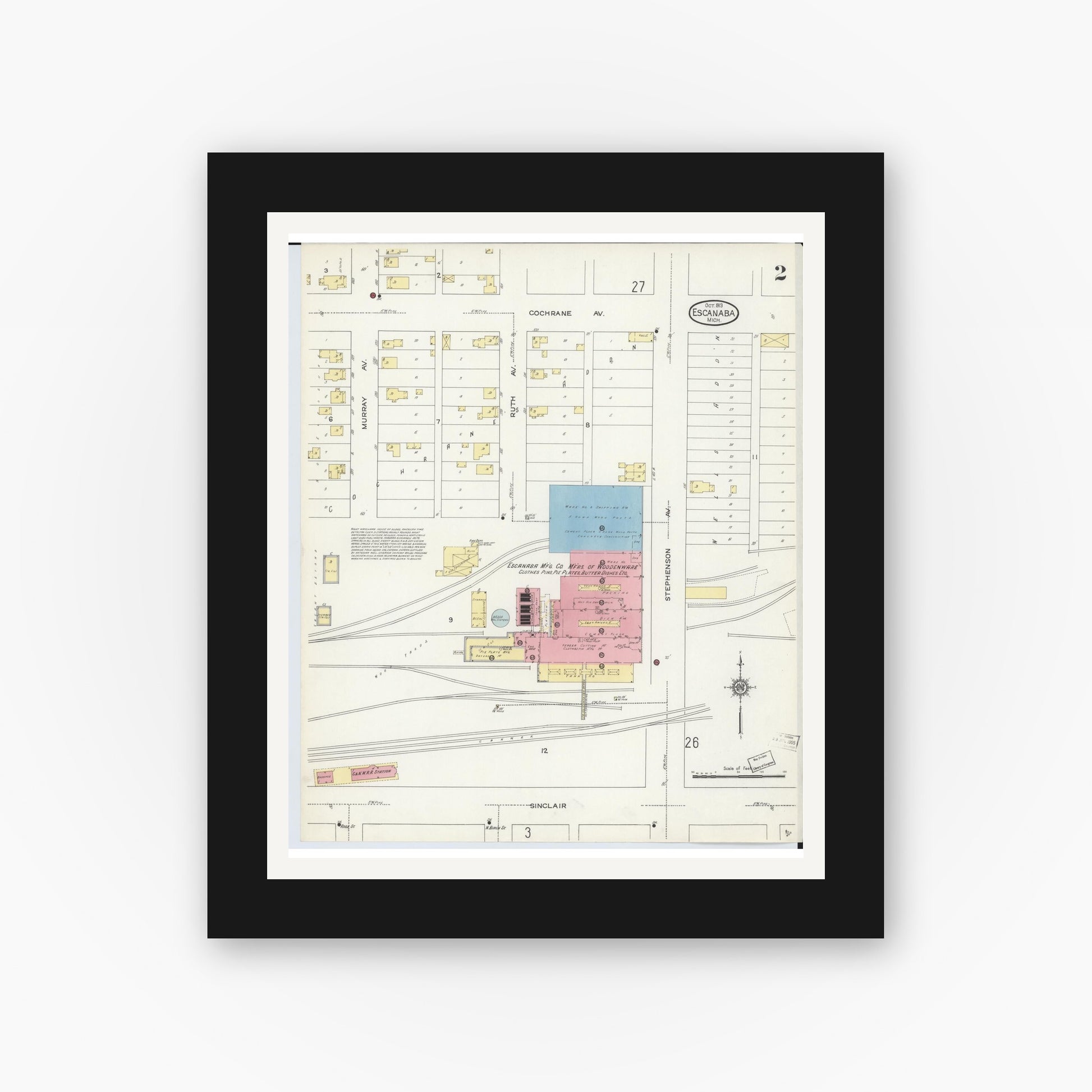 Old map wall art mockup — black gallery frame with white mat — Sanborn Fire Insurance Map from Escanaba, Delta County, Michigan (1913), Sheet #0002