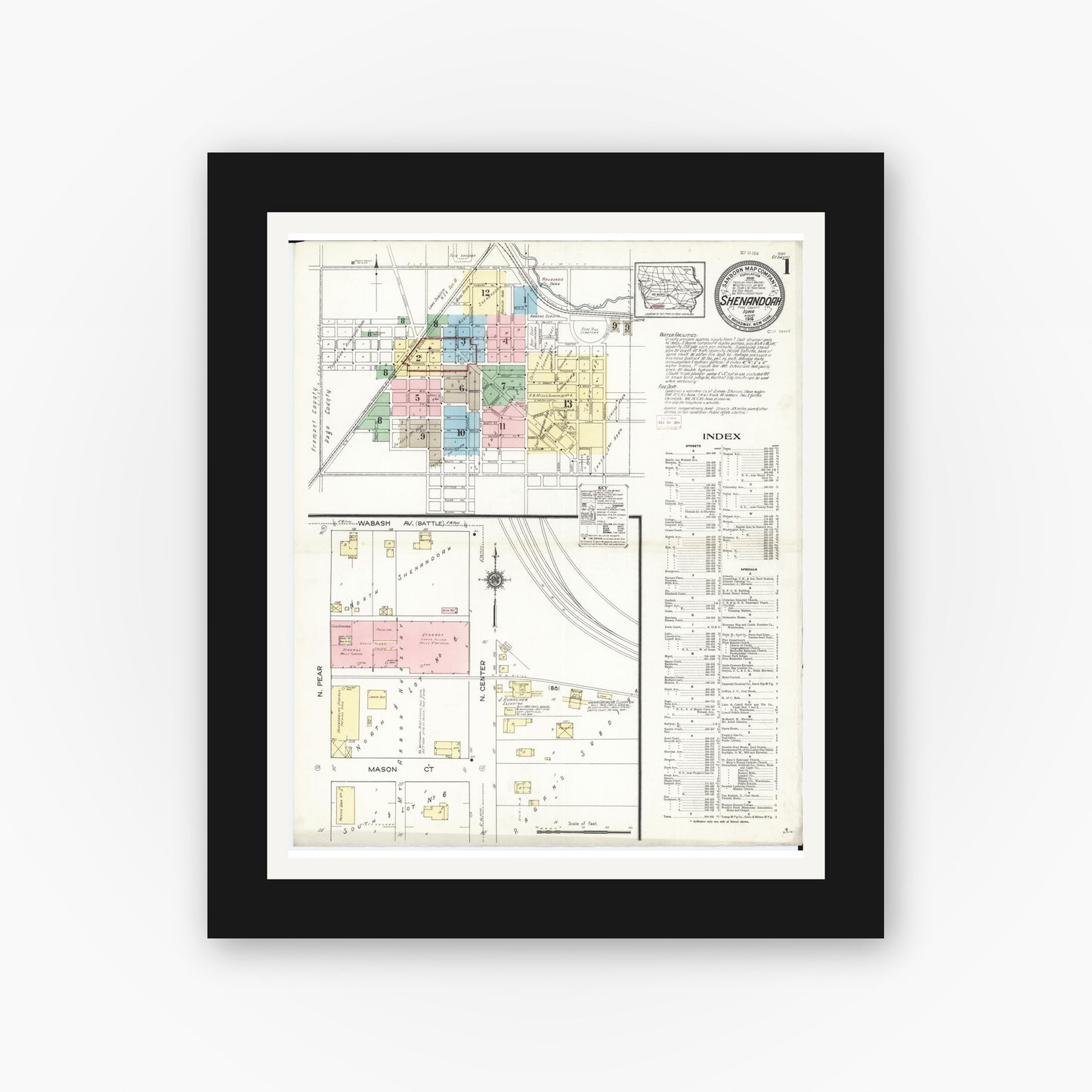 Old map wall art mockup — black gallery frame with white mat — Sanborn Fire Insurance Map from Shenandoah, Page County, Iowa (1914) â€” Complete Set