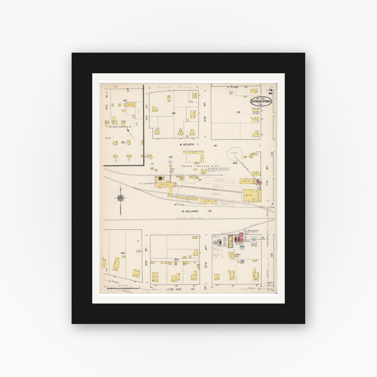 Old map wall art mockup — black gallery frame with white mat — Sanborn Fire Insurance Map from De Funiak Springs, Walton County, Florida (1922), Sheet #0002