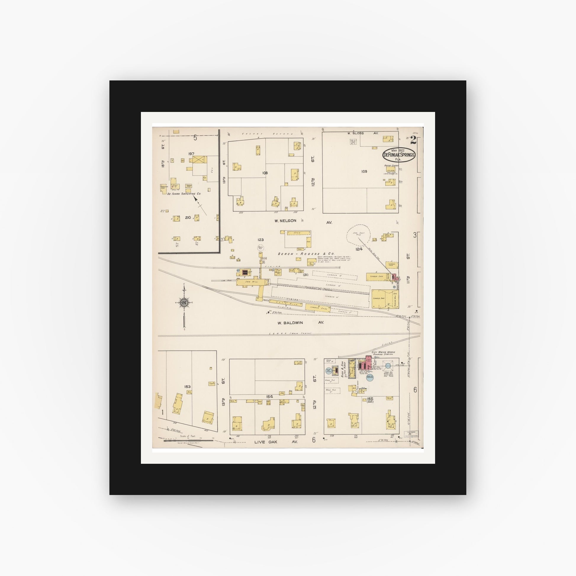 Old map wall art mockup — black gallery frame with white mat — Sanborn Fire Insurance Map from De Funiak Springs, Walton County, Florida (1922), Sheet #0002
