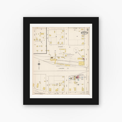 Old map wall art mockup — black gallery frame with white mat — Sanborn Fire Insurance Map from De Funiak Springs, Walton County, Florida (1922), Sheet #0002