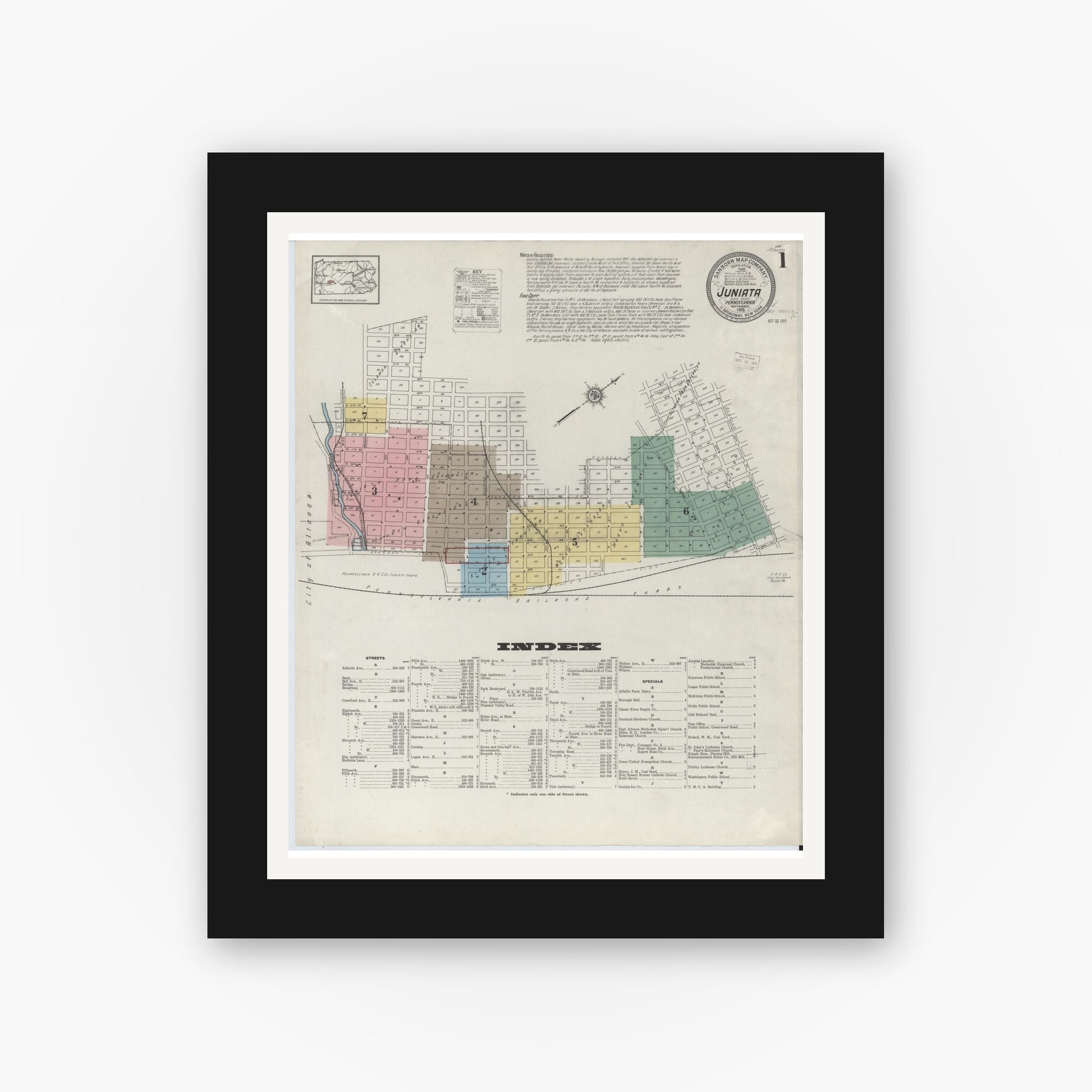 Old map wall art mockup — black gallery frame with white mat — Sanborn Fire Insurance Map from Juniata, Blair County, Pennsylvania (1915), Sheet #0001