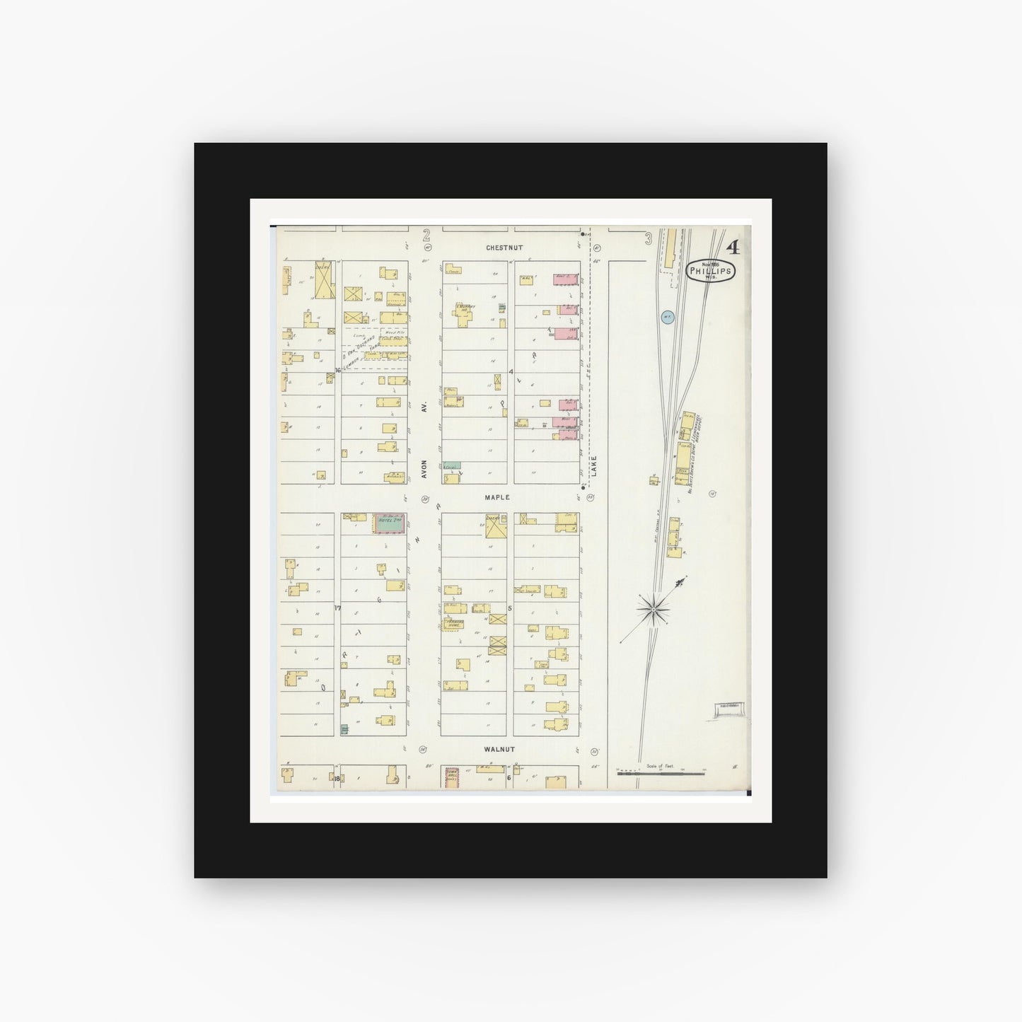 Old map wall art mockup — black gallery frame with white mat — Sanborn Fire Insurance Map from Phillips, Price County, Wisconsin (1895), Sheet #0004