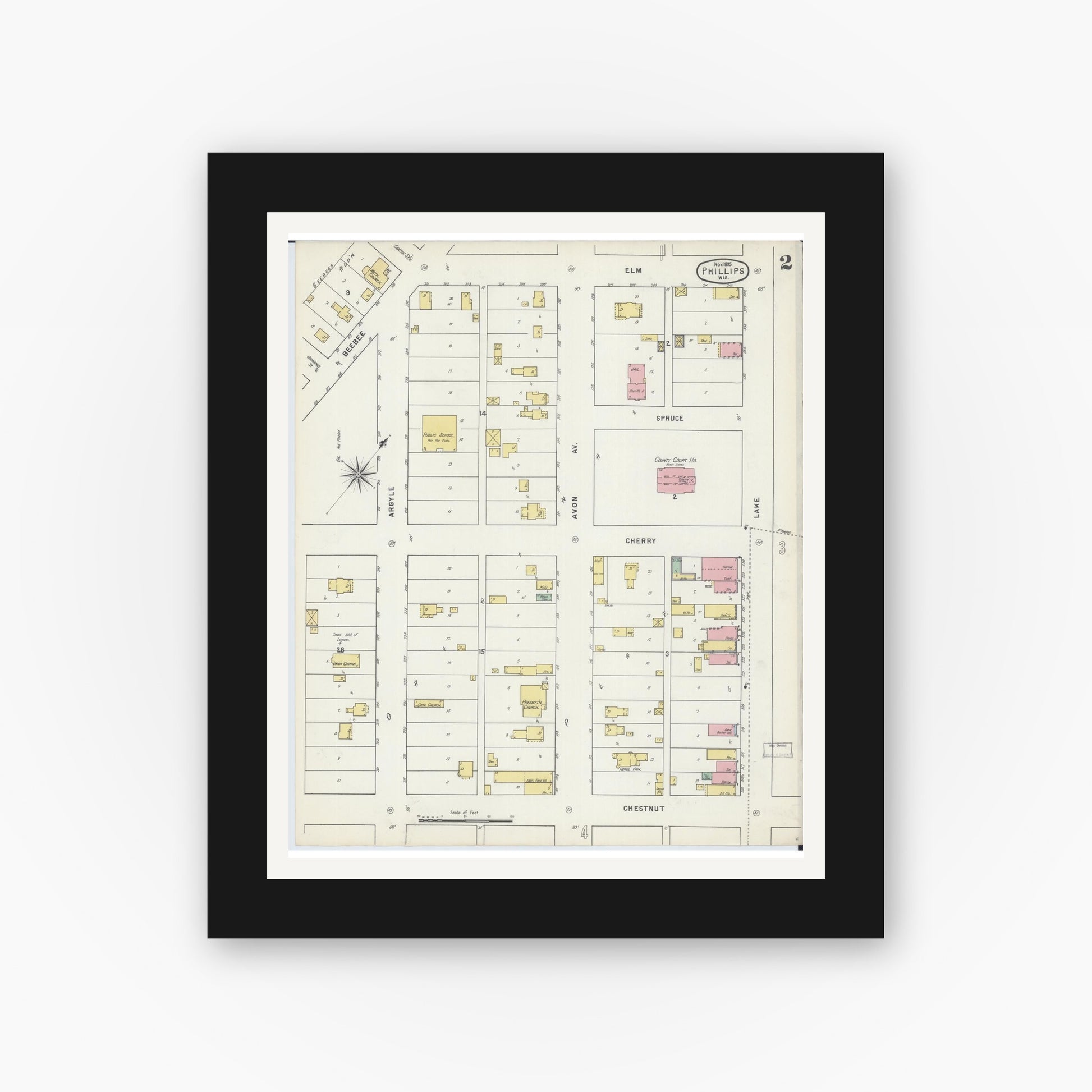 Old map wall art mockup — black gallery frame with white mat — Sanborn Fire Insurance Map from Phillips, Price County, Wisconsin (1895), Sheet #0002