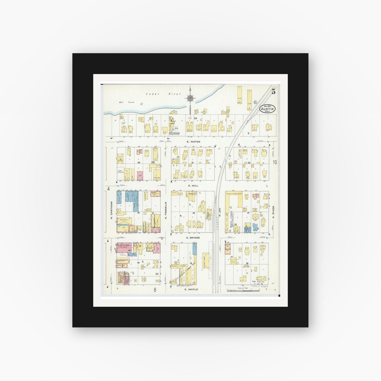Old map wall art mockup — black gallery frame with white mat — Sanborn Fire Insurance Map from Austin, Mower County, Minnesota (1910), Sheet #0005
