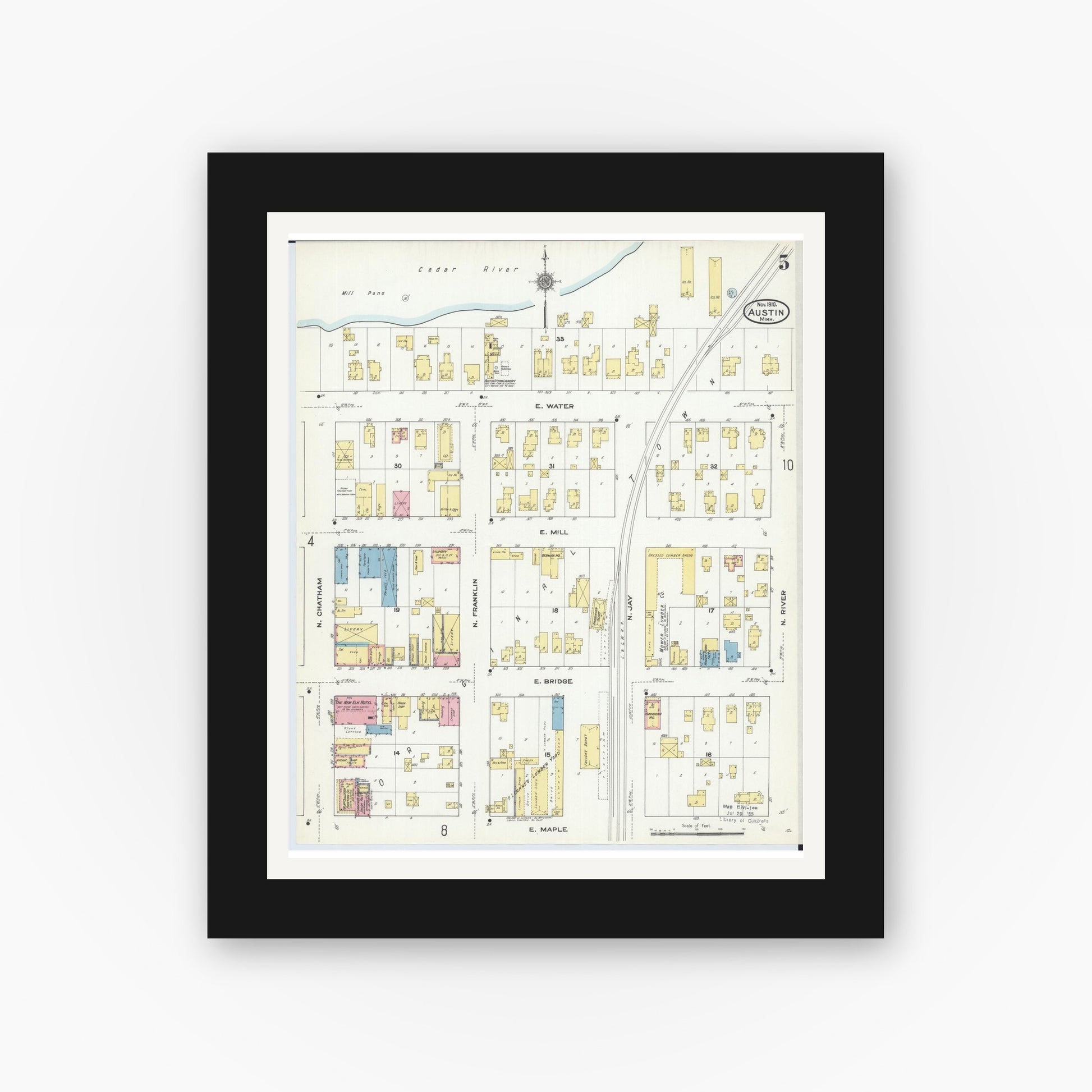 Old map wall art mockup — black gallery frame with white mat — Sanborn Fire Insurance Map from Austin, Mower County, Minnesota (1910), Sheet #0005