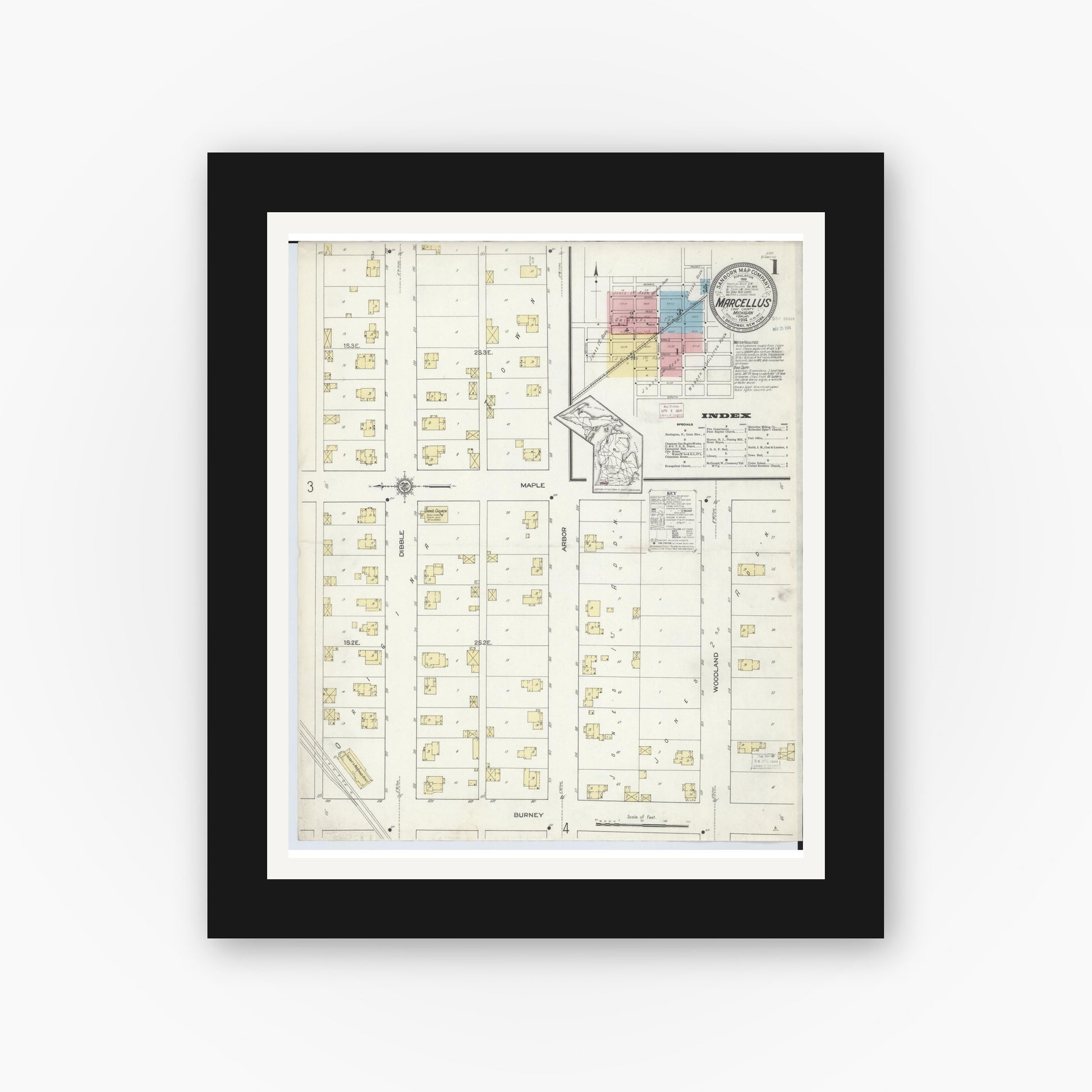 Old map wall art mockup — black gallery frame with white mat — Sanborn Fire Insurance Map from Marcellus, Cass County, Michigan (1914) - Complete Map Set