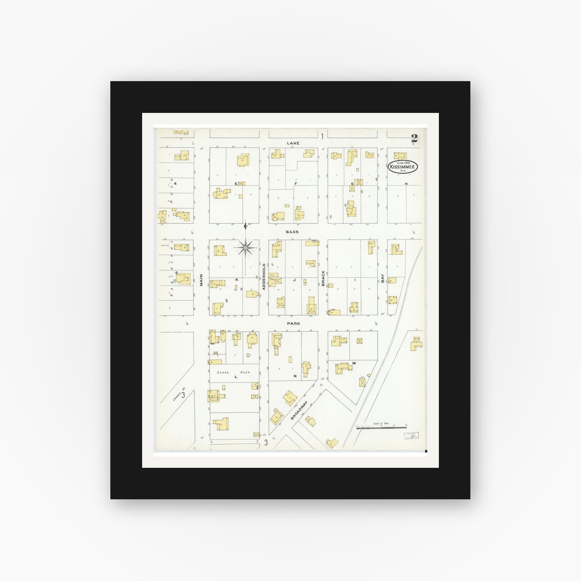 Old map wall art mockup — black gallery frame with white mat — Sanborn Fire Insurance Map from Kissimmee, Osceola County, Florida (1909), Sheet #0002