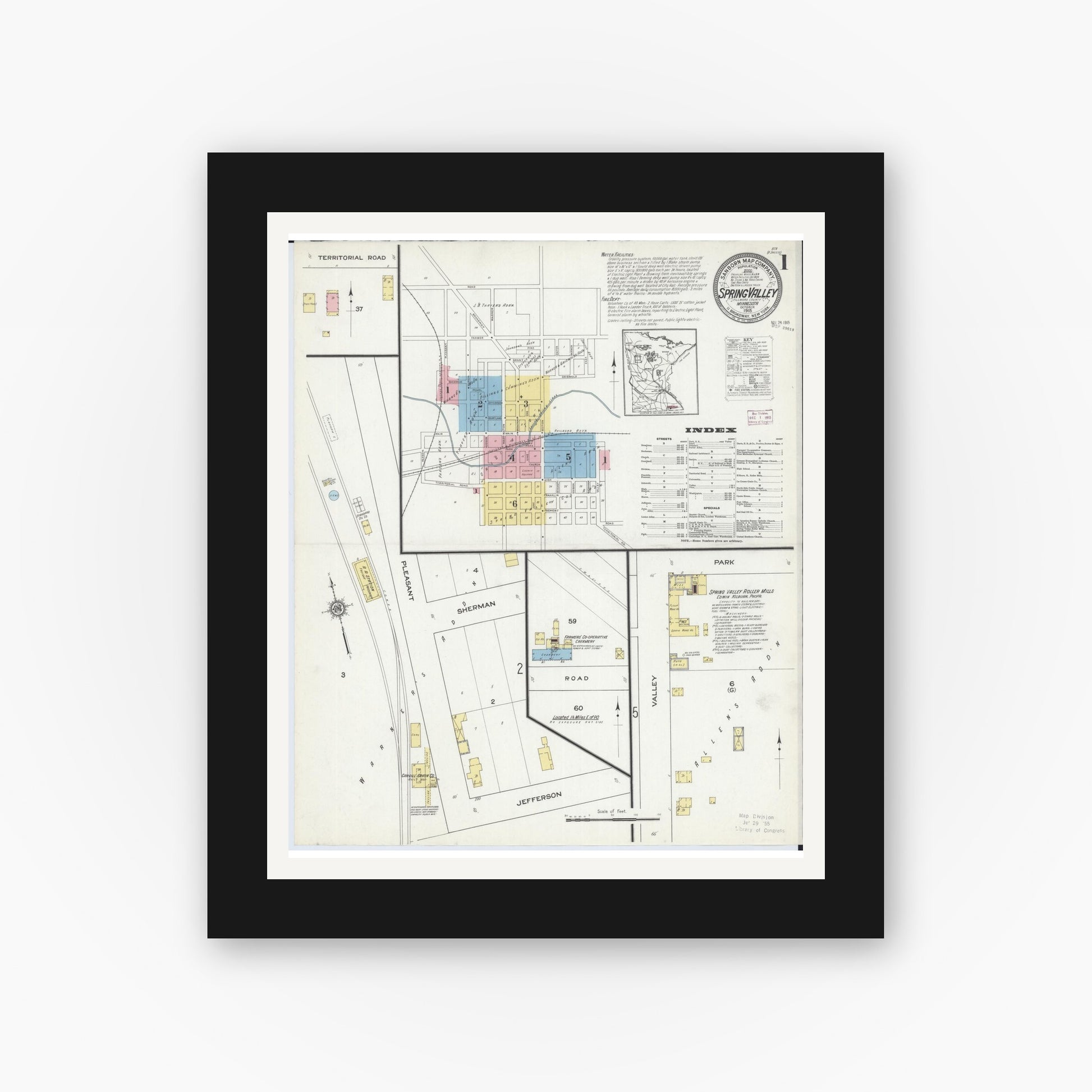 Old map wall art mockup — black gallery frame with white mat — Sanborn Fire Insurance Map from Spring Valley, Fillmore County, Minnesota (1915) - Complete Map Set