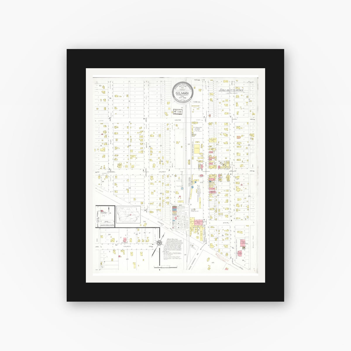 Old map wall art mockup — black gallery frame with white mat — Sanborn Fire Insurance Map from Gilman, Marshall County, Iowa (1932), Sheet #0001