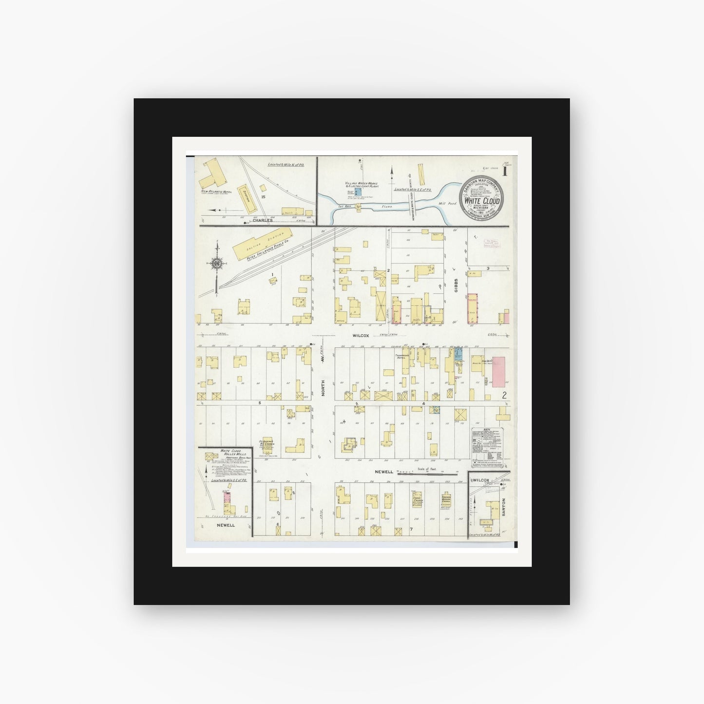 Old map wall art mockup — black gallery frame with white mat — Sanborn Fire Insurance Map from White Cloud, Newaygo County, Michigan (1911) - Complete Map Set