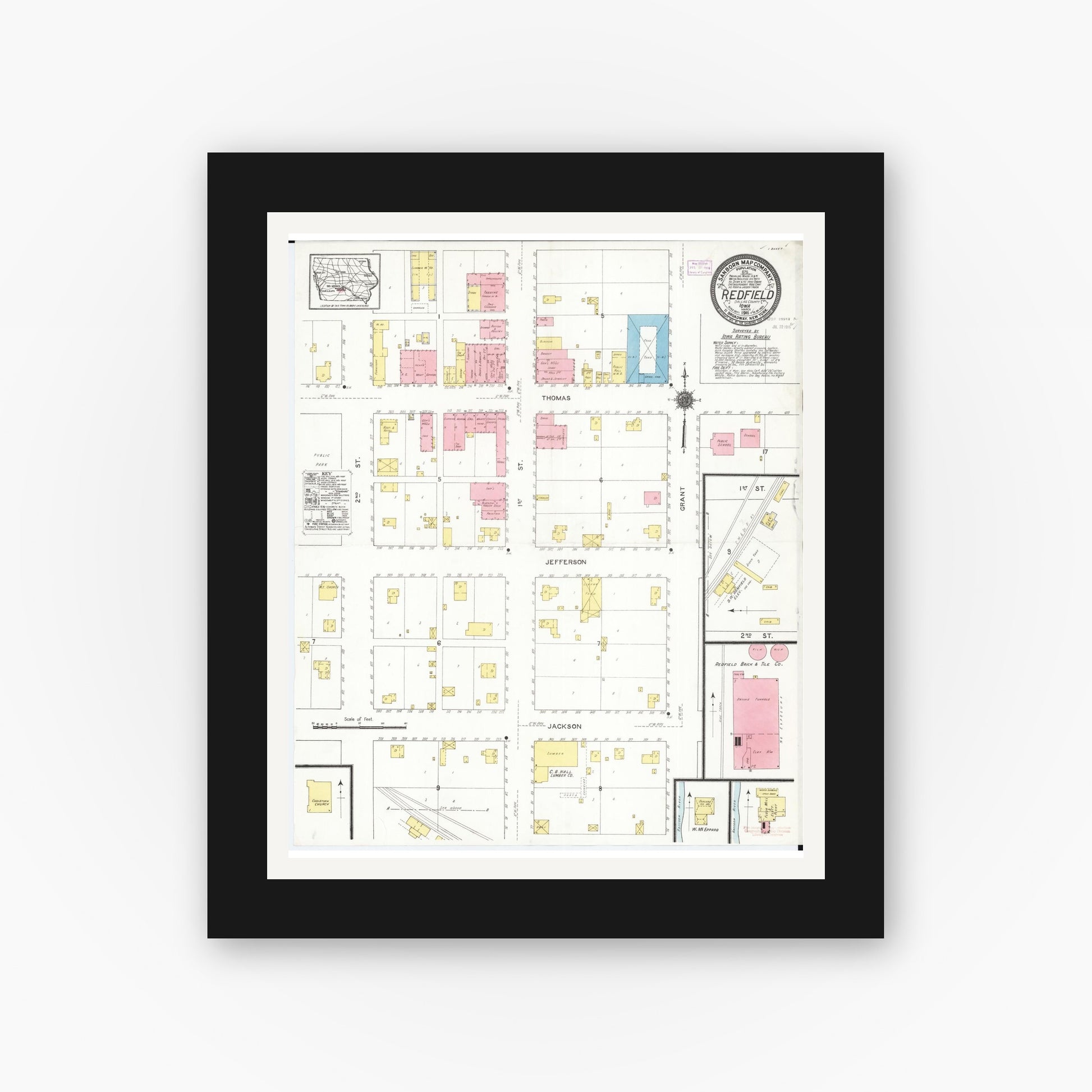 Old map wall art mockup — black gallery frame with white mat — Sanborn Fire Insurance Map from Redfield, Dallas County, Iowa (1916), Sheet #0001