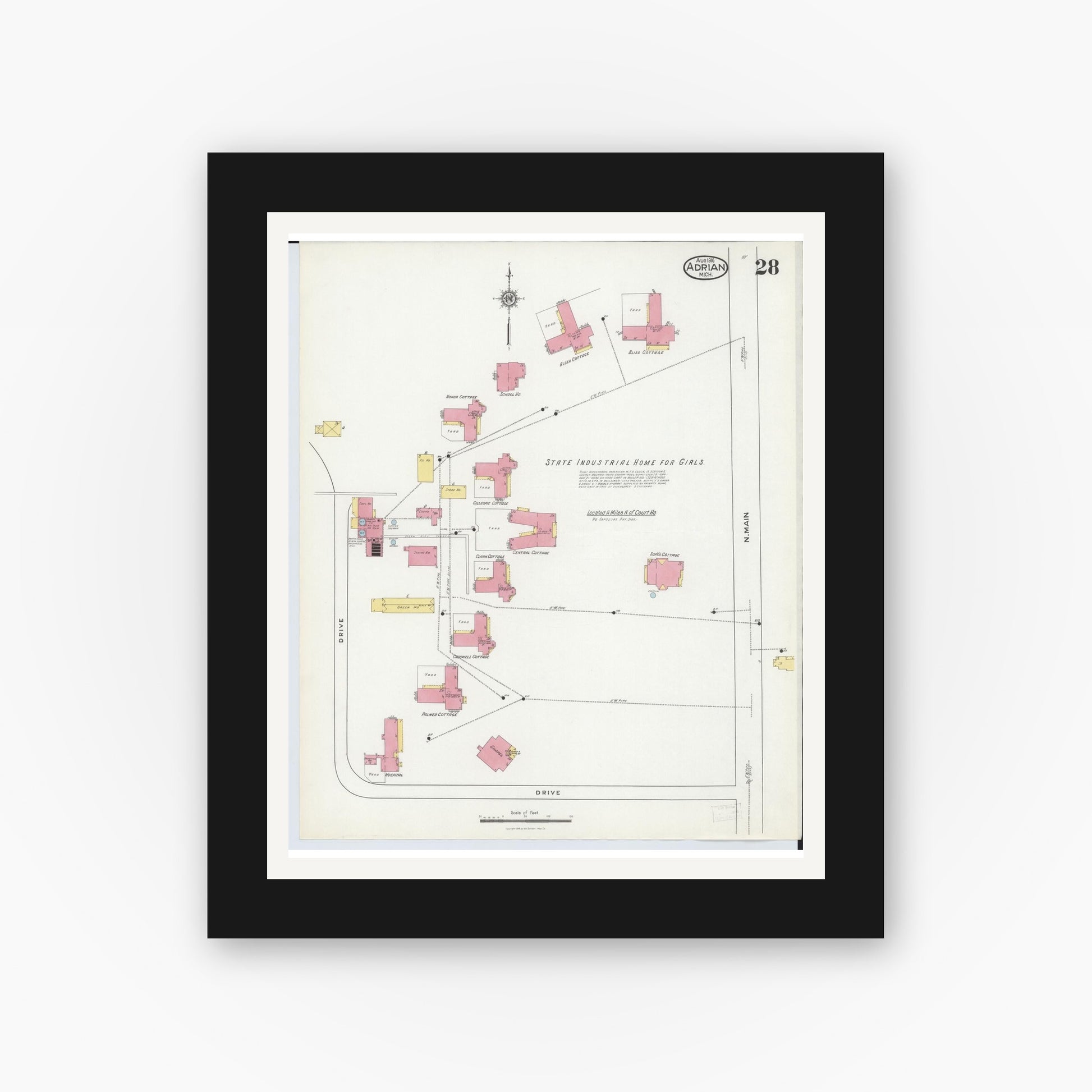 Old map wall art mockup — black gallery frame with white mat — Sanborn Fire Insurance Map from Adrian, Lenawee County, Michigan (1916), Sheet #0028