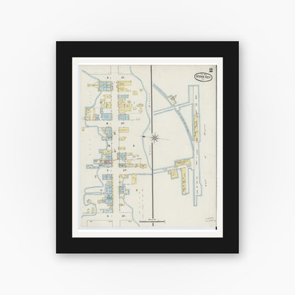 Old map wall art mockup — black gallery frame with white mat — Sanborn Fire Insurance Map from Cedar Key, Levy County, Florida (1890), Sheet #0002