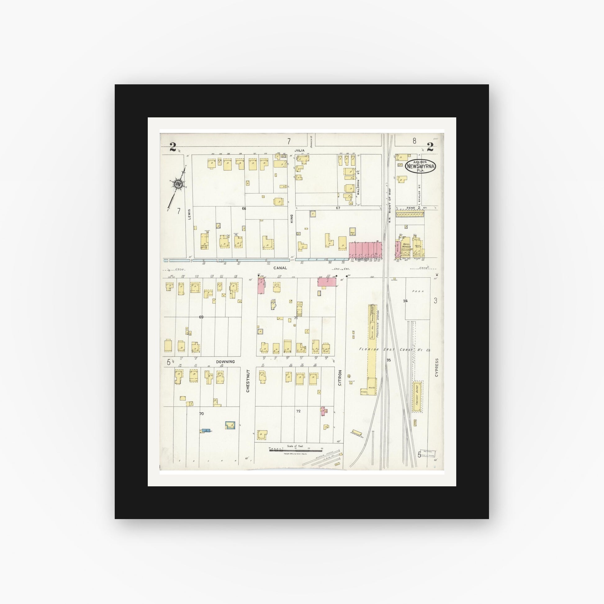 Old map wall art mockup — black gallery frame with white mat — Sanborn Fire Insurance Map from New Smyrna, Valusia County, Florida (1924), Sheet #0002