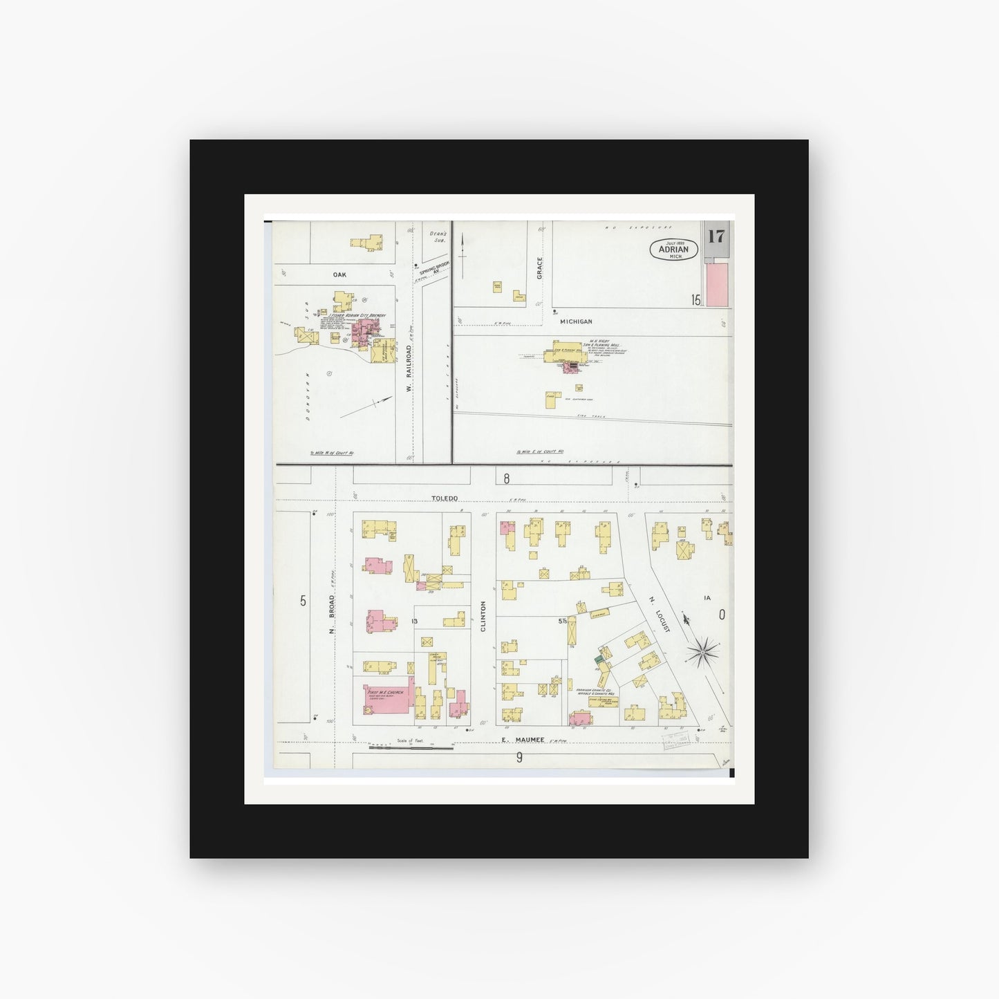 Old map wall art mockup — black gallery frame with white mat — Sanborn Fire Insurance Map from Adrian, Lenawee County, Michigan (1899), Sheet #0017