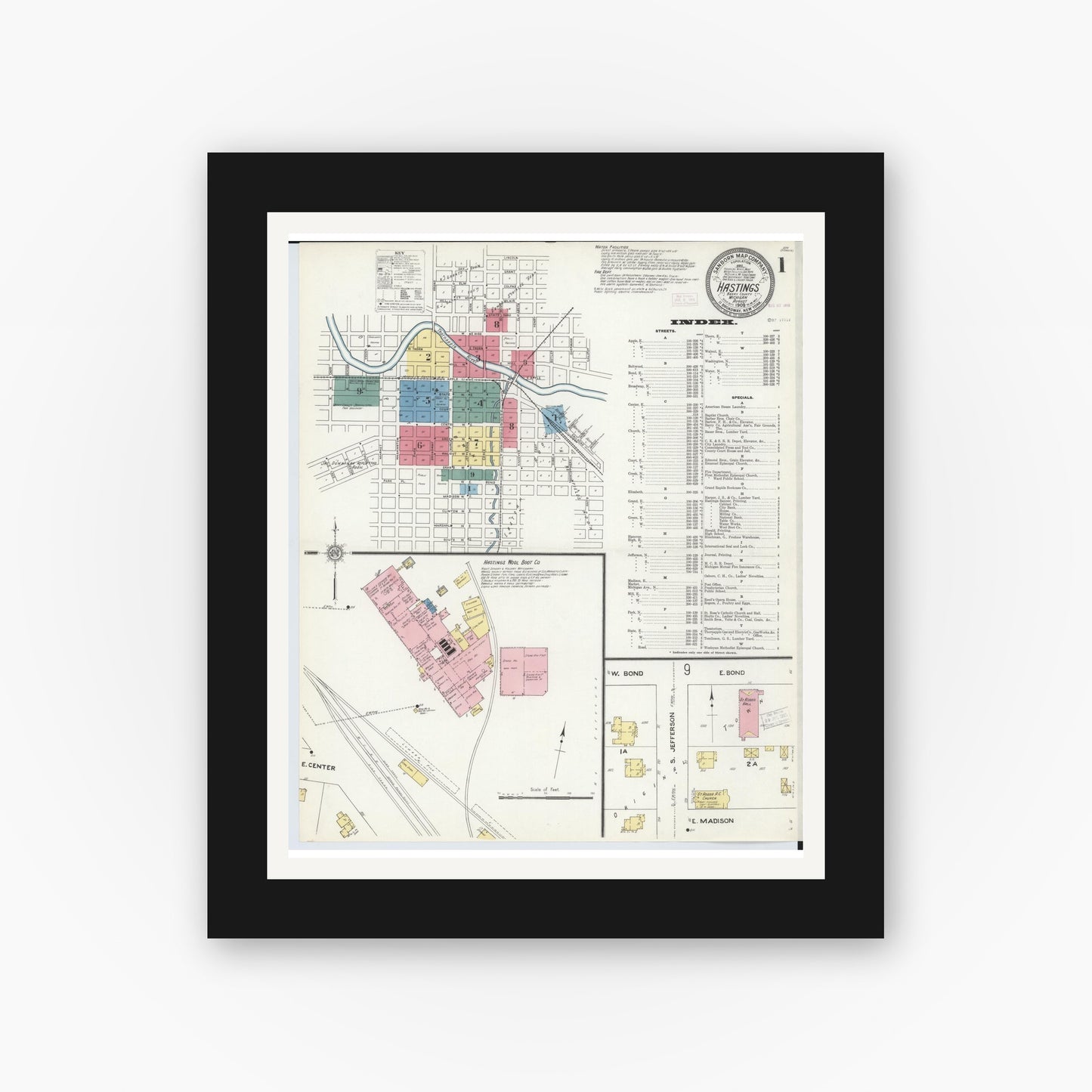 Old map wall art mockup — black gallery frame with white mat — Sanborn Fire Insurance Map from Hastings, Barry County, Michigan (1909), Sheet #0001