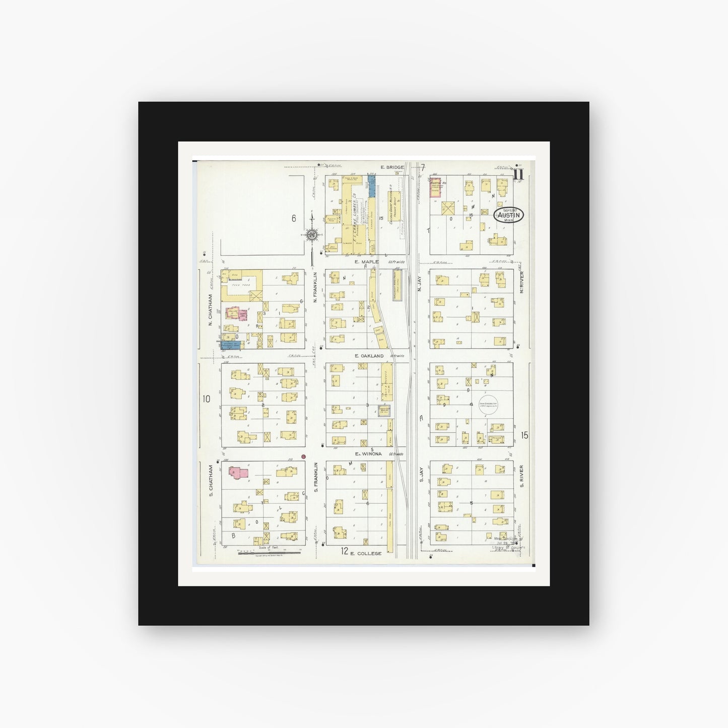 Old map wall art mockup — black gallery frame with white mat — Sanborn Fire Insurance Map from Austin, Mower County, Minnesota (1917), Sheet #0011